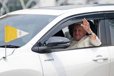 Pope tours Indonesia in ordinary family car as he faces first test of his health