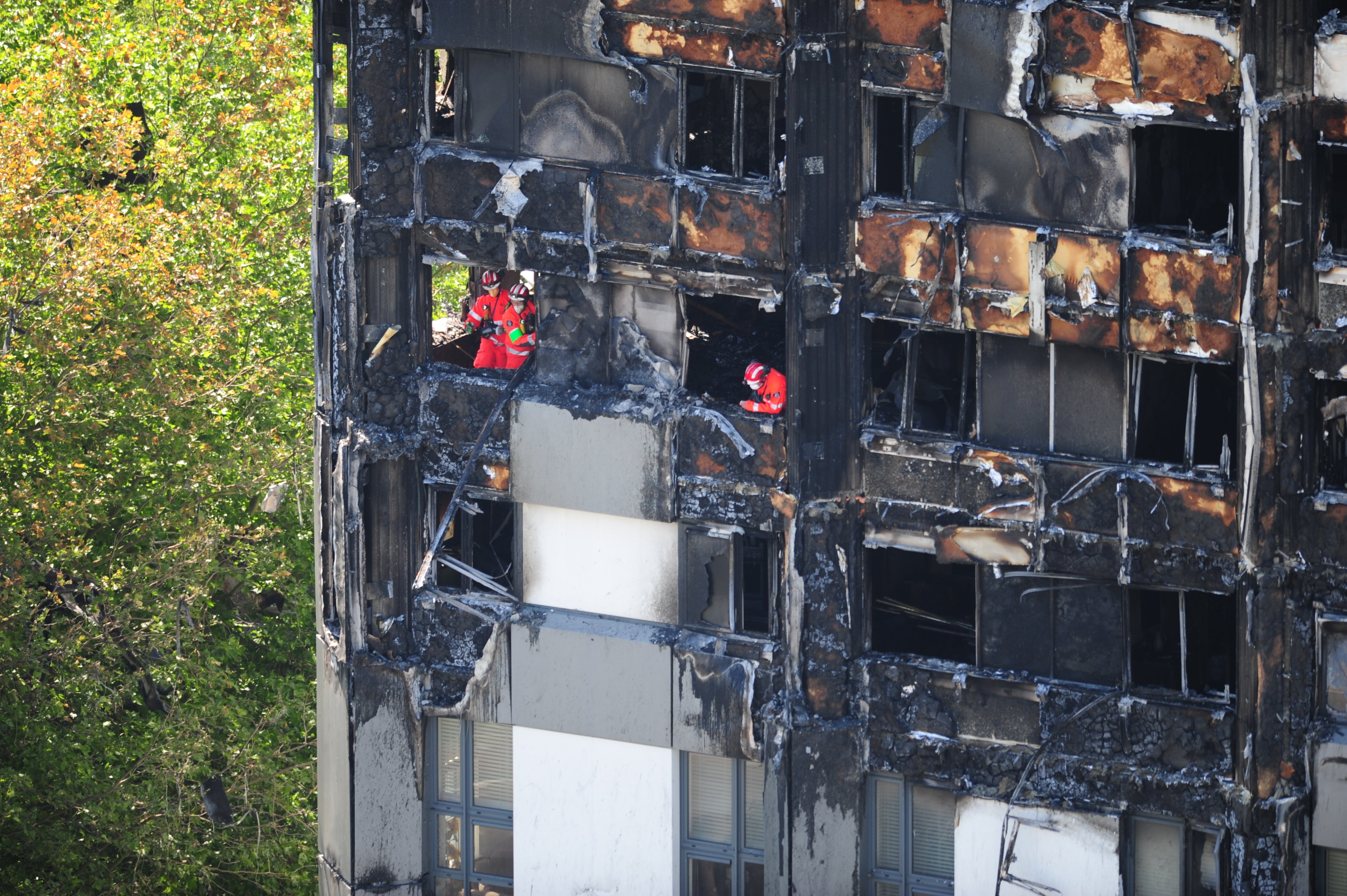 Urban search and rescue officers from London Fire Brigade inside Grenfell Tower (David Mirzoeff/PA)