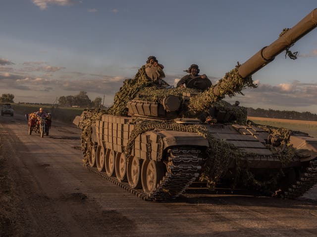 <p>Ukrainian servicemen operate a Soviet-made T-72 tank in the Sumy region, near the border with Russia</p>