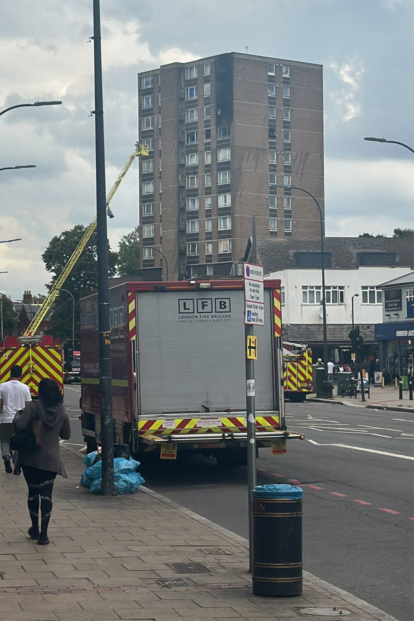 The highest floors of the Catford block of flats appear burnt out by the blaze