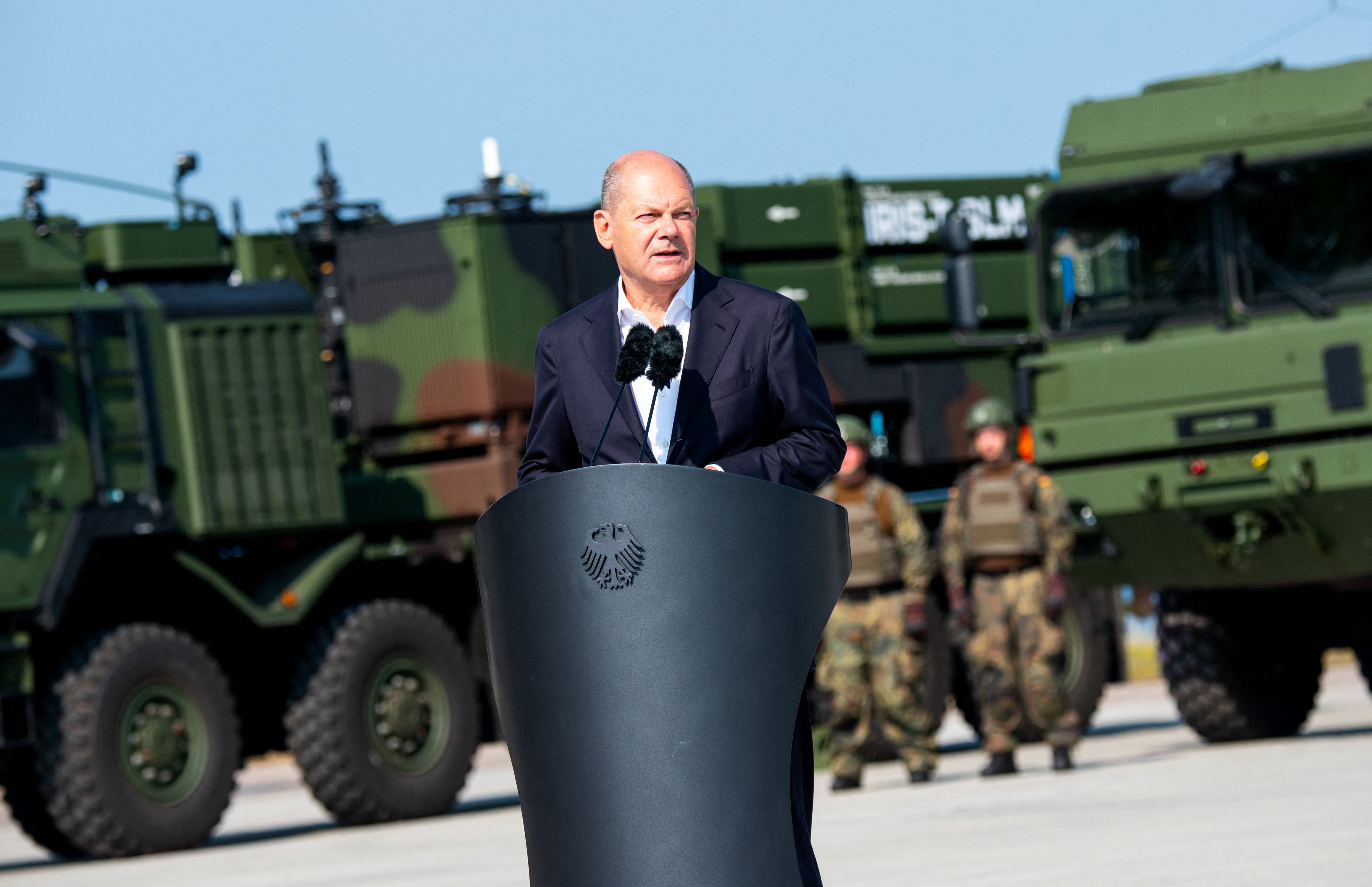 German Chancellor Olaf Scholz speaking during the presentation of Germany's first IRIS-T SLM medium range air defence system at the military base camp in Todendorf, northern Germany, in September