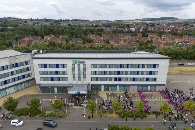 Demonstrators and counter-demonstrators outside the Holiday Inn Express in Manvers Way, Rotherham, South Yorkshire (Danny Lawson/PA)