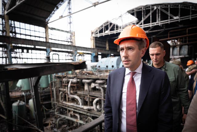 Taoiseach Simon Harris during a visit to the Trypilska thermal power plant (Stefan Rousseau/PA)