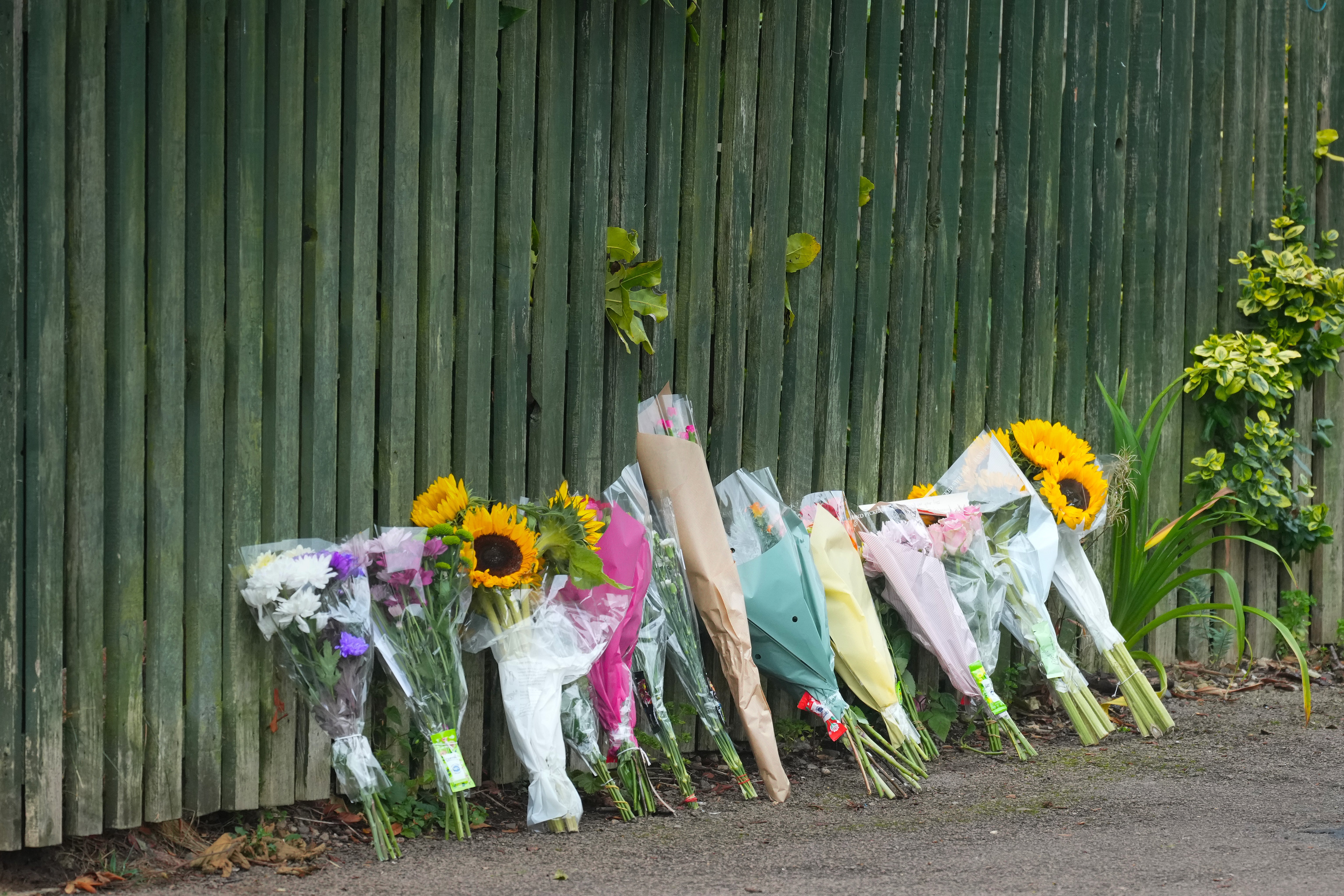 Flowers and tributes to Mr Kohli left near the Bramble Way entrance to Franklin Park