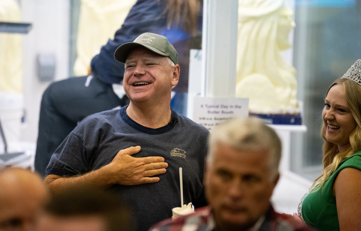 Tim Walz aims donut jibe at JD Vance on visit to Pennsylvania farmers’ market