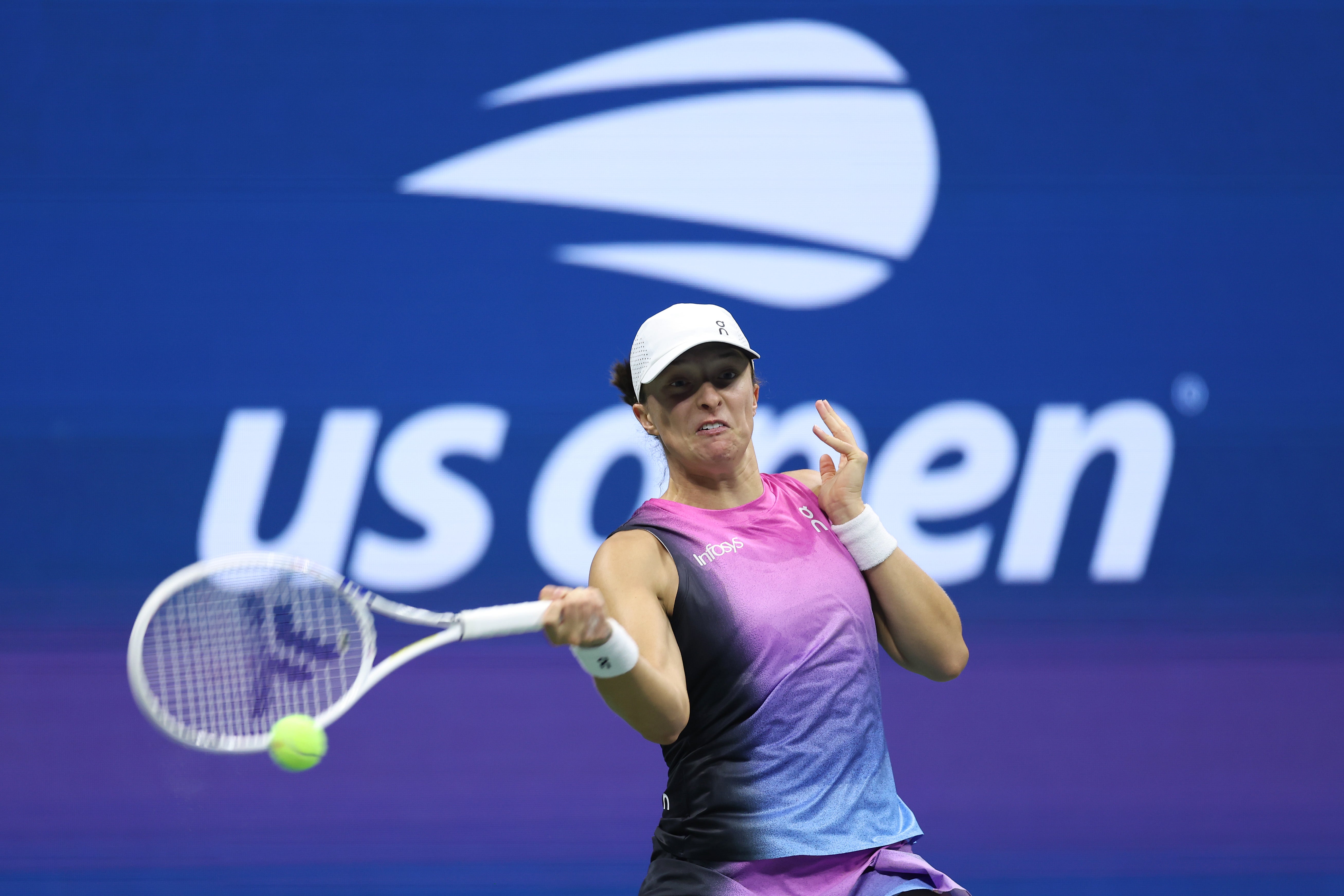 NEW YORK, NEW YORK - SEPTEMBER 04: Iga Swiatek of Poland returns a shot against Jessica Pegula of the United States during their Women's Singles Quarterfinal match on Day Ten of the 2024 US Open at USTA Billie Jean King National Tennis Center on September 04, 2024 in the Flushing neighborhood of the Queens borough of New York City. (Photo by Luke Hales/Getty Images)