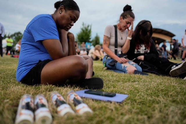 <p>Mourners pray during a candlelight vigil for the slain students and teachers at Apalachee High School, Wednesday, Sept. 4, 2024, in Winder, Ga. (AP Photo/Mike Stewart)</p>