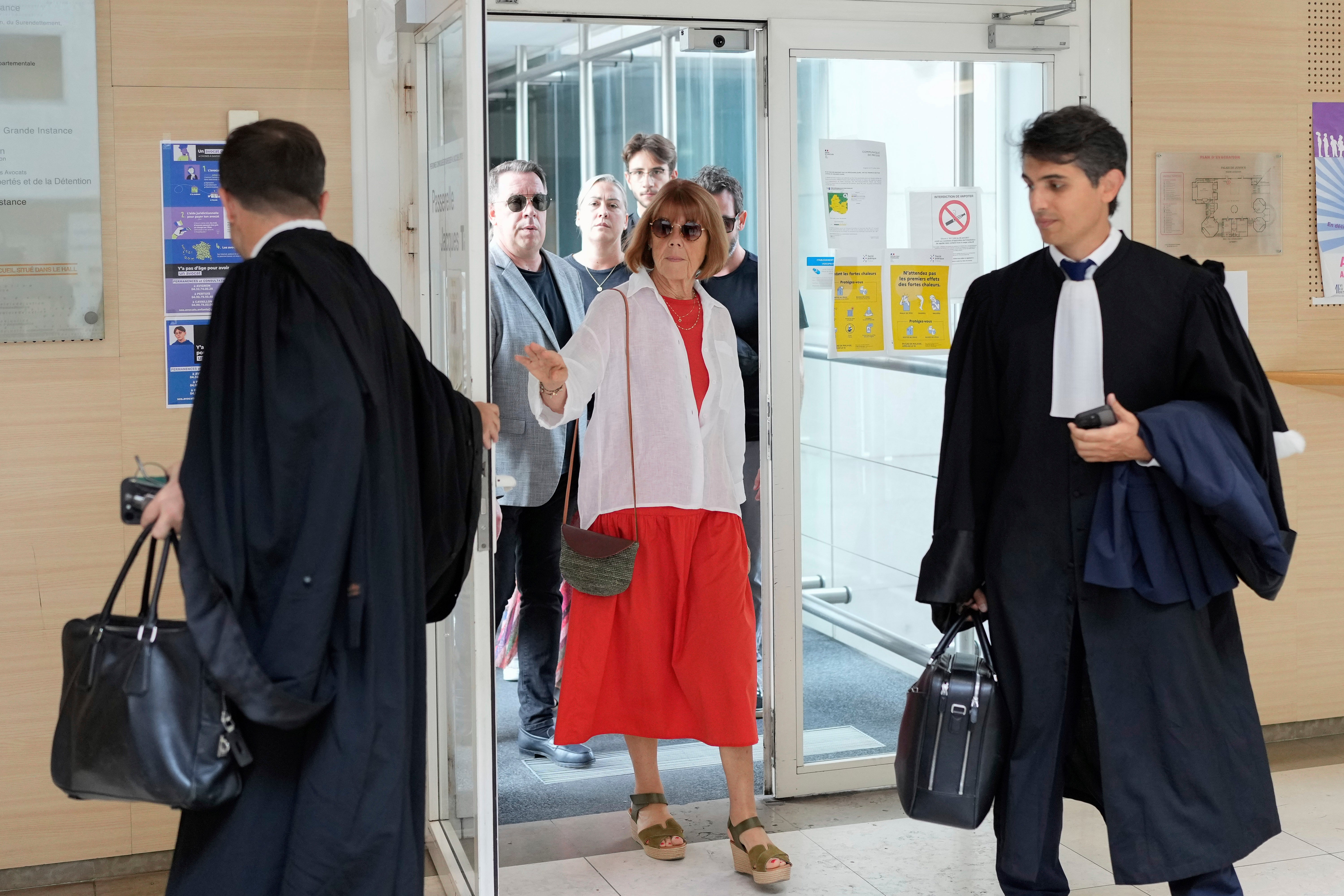 Gisele Pelicot (centre) arrives in the Avignon court house in southern France on Thursday