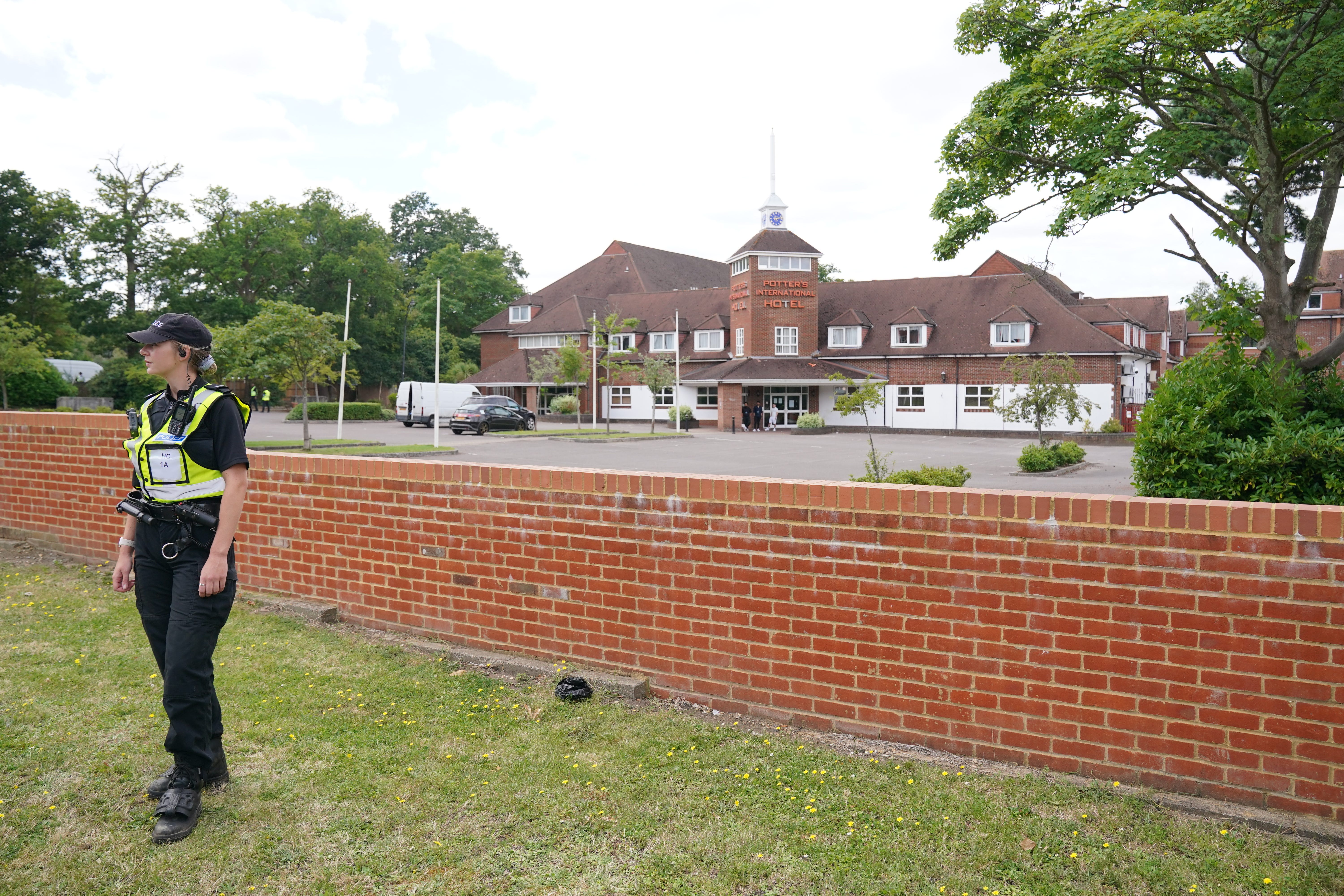 People protested at Potters International Hotel in Aldershot (Jonathan Brady/PA)