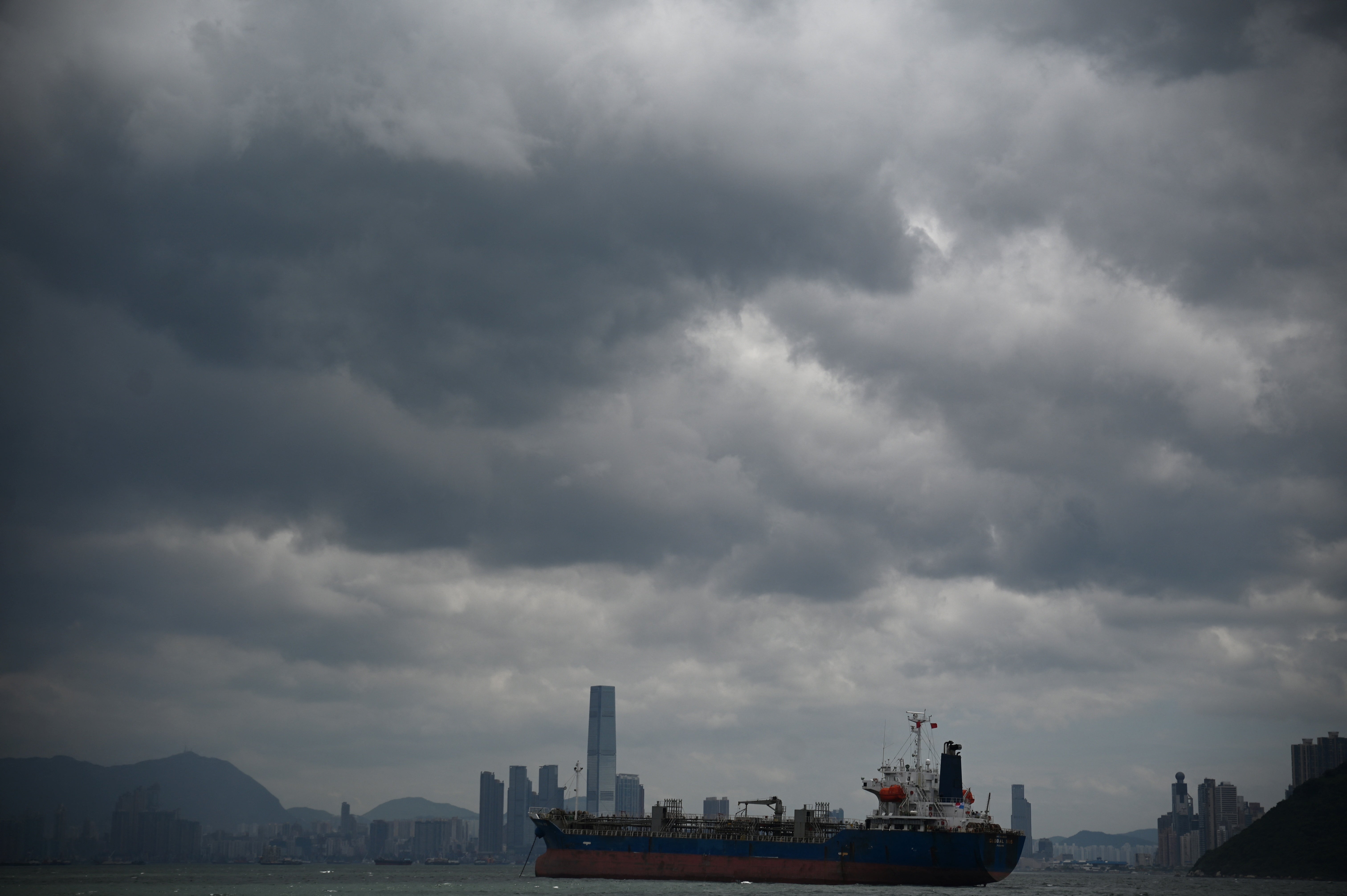 A ship passes by amid gathering storm clouds in Victoria Harbour, Hong Kong, on September 5, 2024, as Super Typhoon Yagi moves across the South China Sea toward China's southern coast.