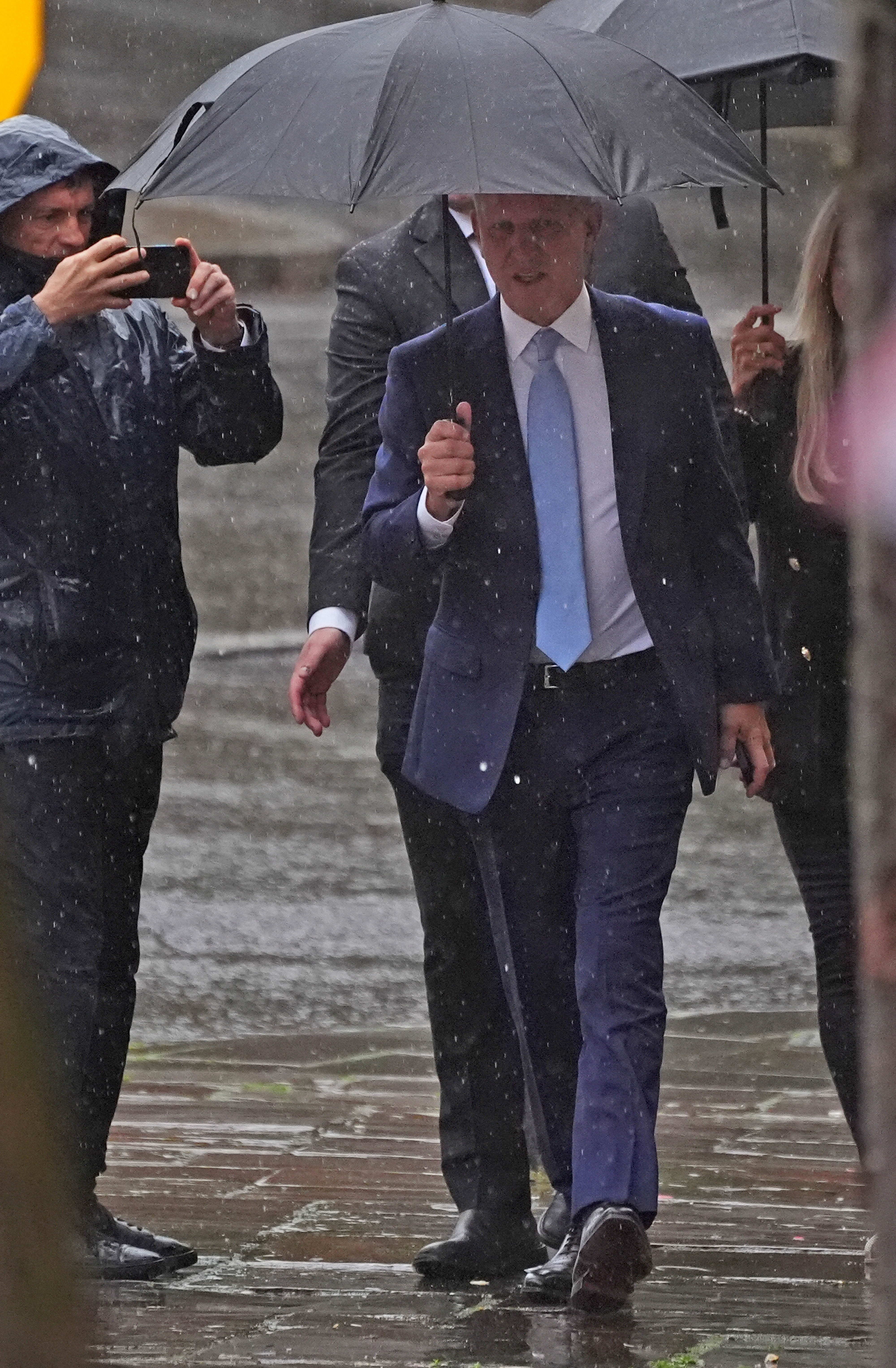 Jeremy Kyle seen arriving in the rain to give evidence