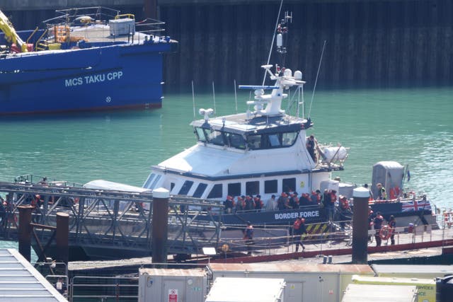 A group of people thought to be migrants are brought in to Dover, Kent, from a Border Force vessel (Gareth Fuller/PA)