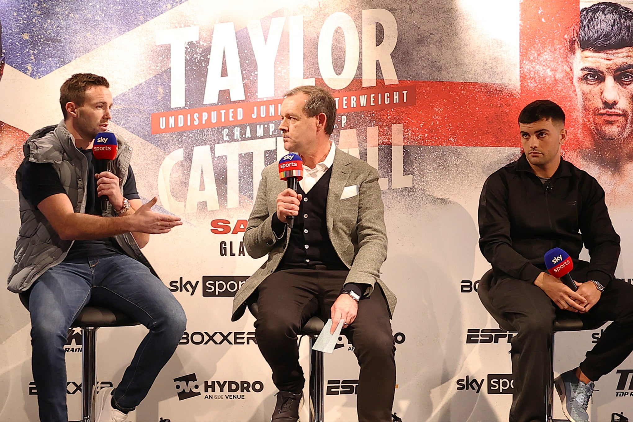 Smith with Josh Taylor (left) and Jack Catterall before their controversial fight in 2022