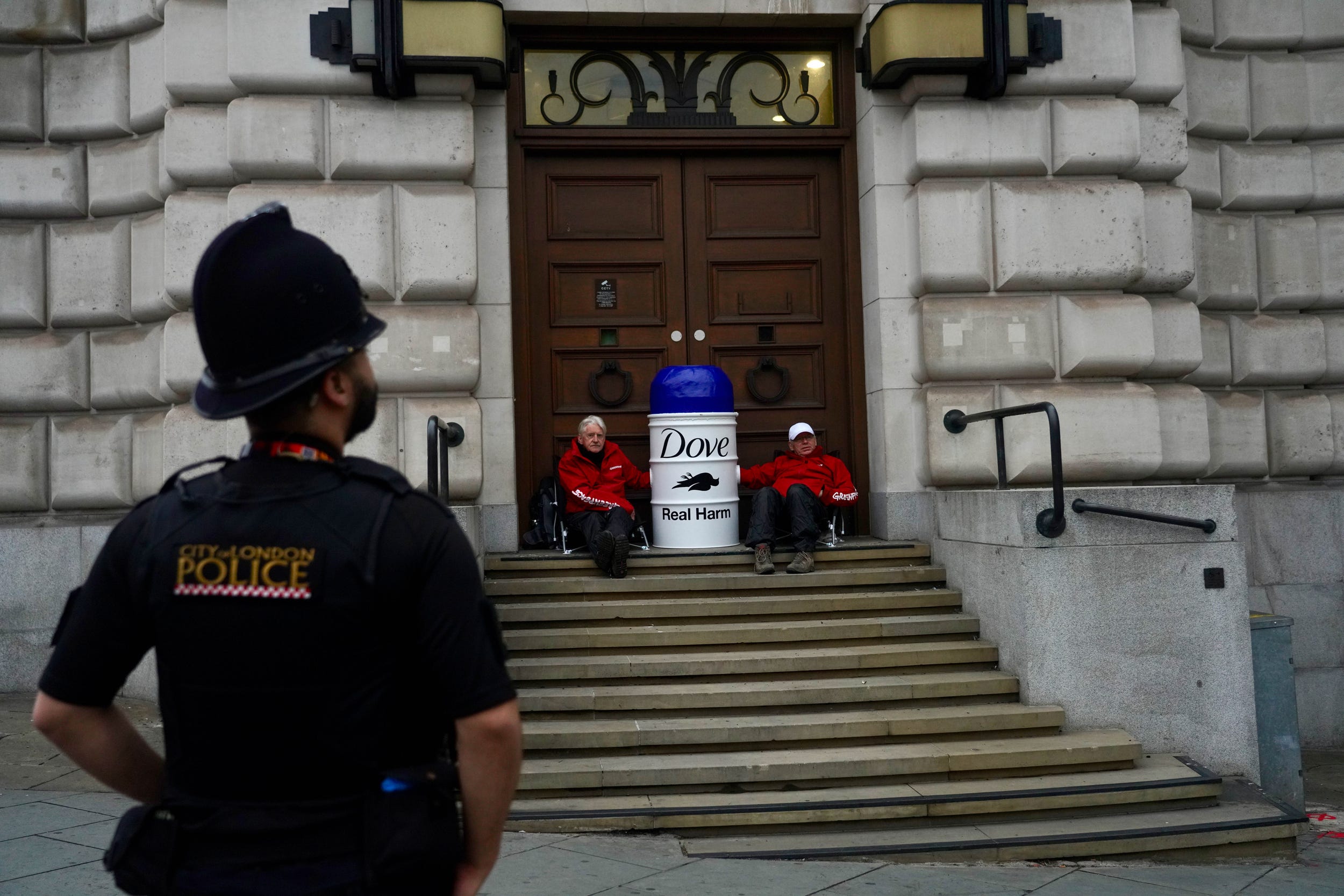 Greenpeace protesters have staged a demonstration outside Unilever’s London headquarters (Kristian Buus/Greenpeace/PA)