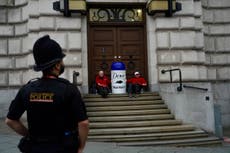 Greenpeace activists scale Unilever headquarters claiming company ‘trashing planet’