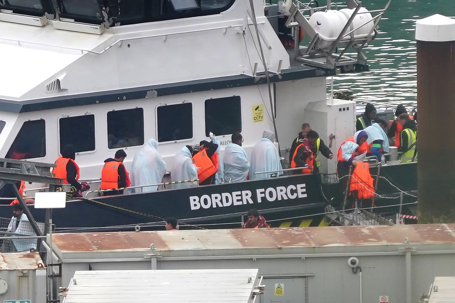 A group of people thought to be migrants are brought in to Dover from a Border Force vessel following a small boat incident in the Channel (Gareth Fuller/PA)