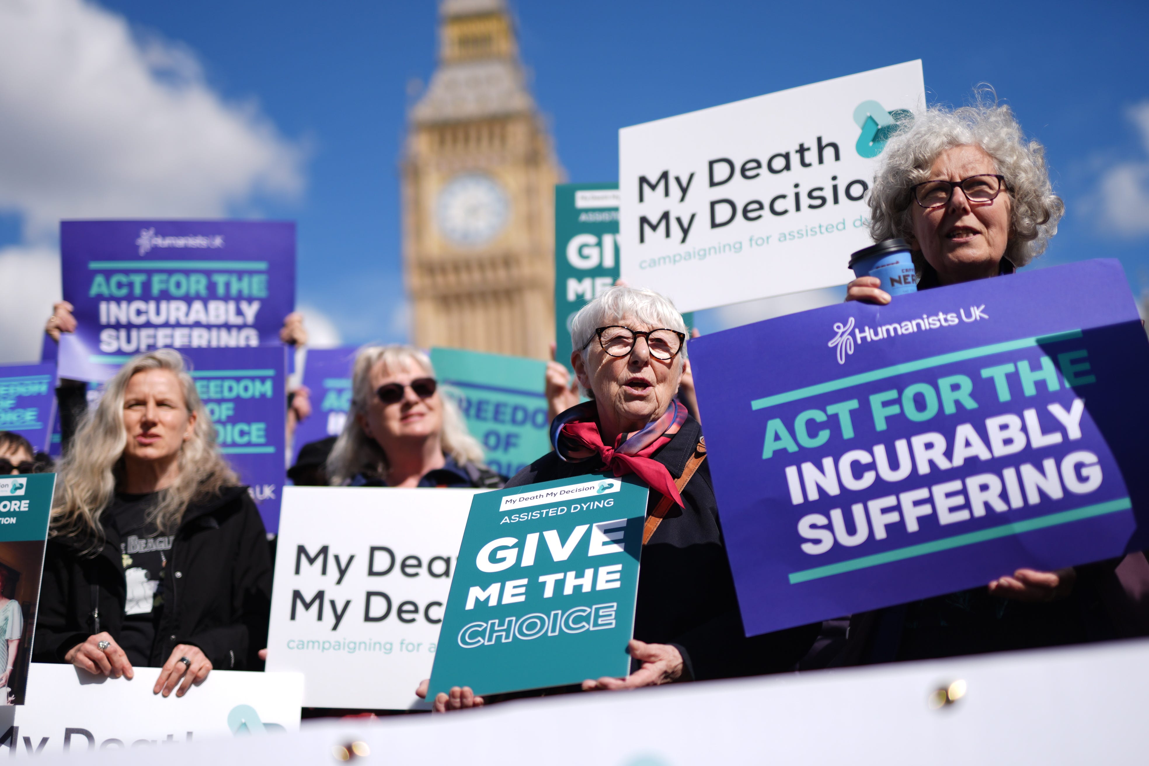 Campaigners in support of assisted dying protest outside Parliament in Westminster, London, in April 2024 (Jordan Pettitt/PA)