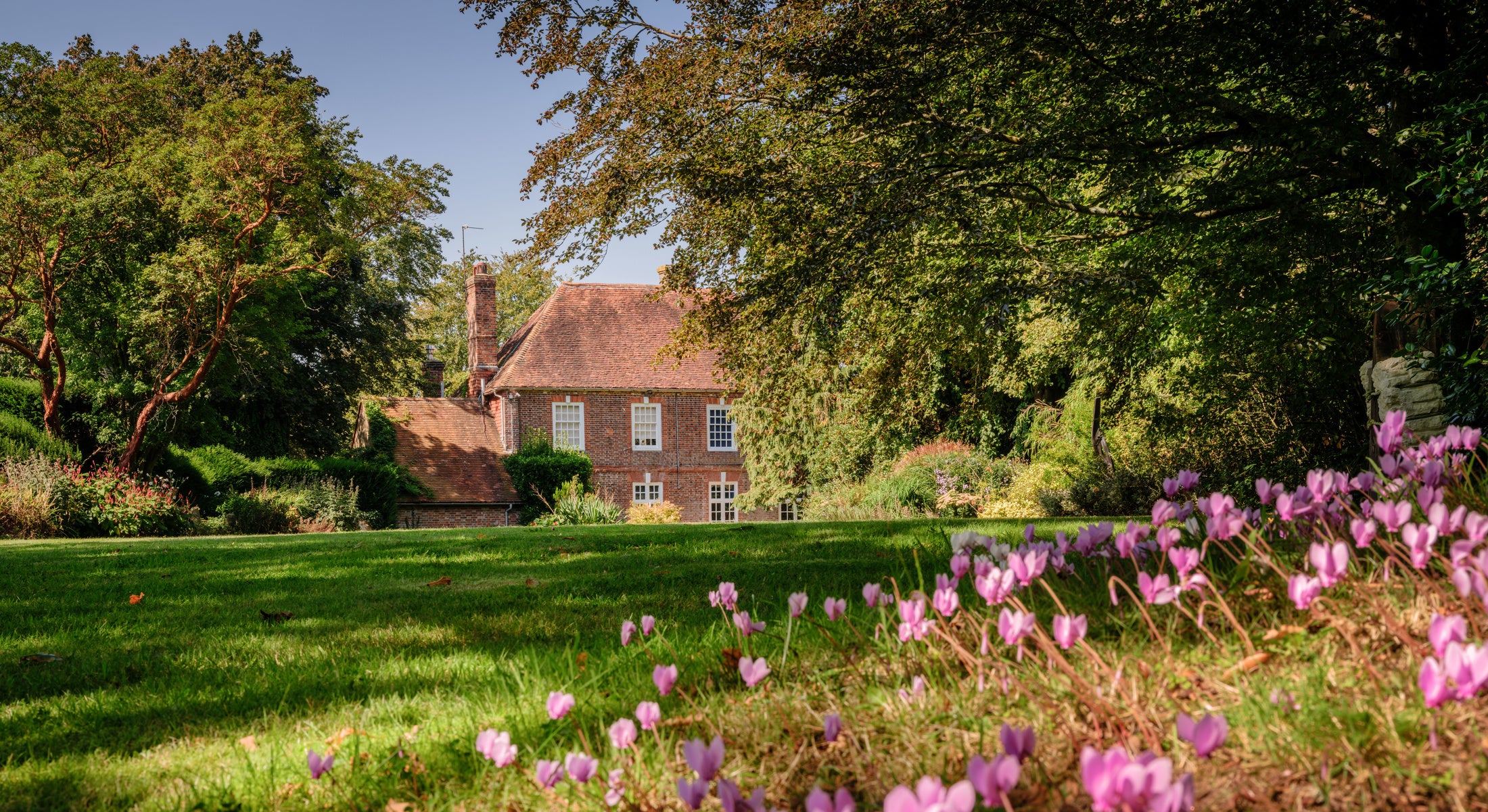 Surrealist art couple Dorothea Tanning and Max Ernst were put to work rewiring lightbulbs and mowing the lawn at Farleys House, Chiddingly