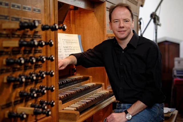 <p>David Goode, organist and music teacher at Eton College, has been banned from teaching for life for searching for inappropriate material  </p>