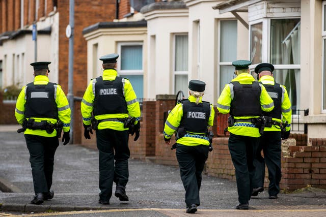 PSNI officers patrol the student area of Belfast known as the Holylands (PA)