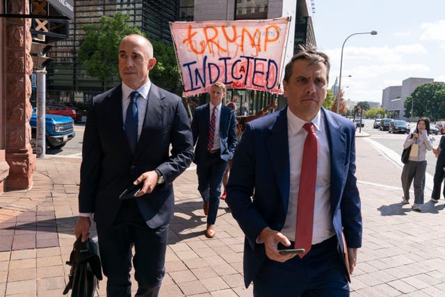 <p>Donald Trump’s attorneys Emil Bove, left, and Todd Blanche leave a federal courthouse in Washington DC on September 5 after a hearing in the former president’s federal election interference case. </p>