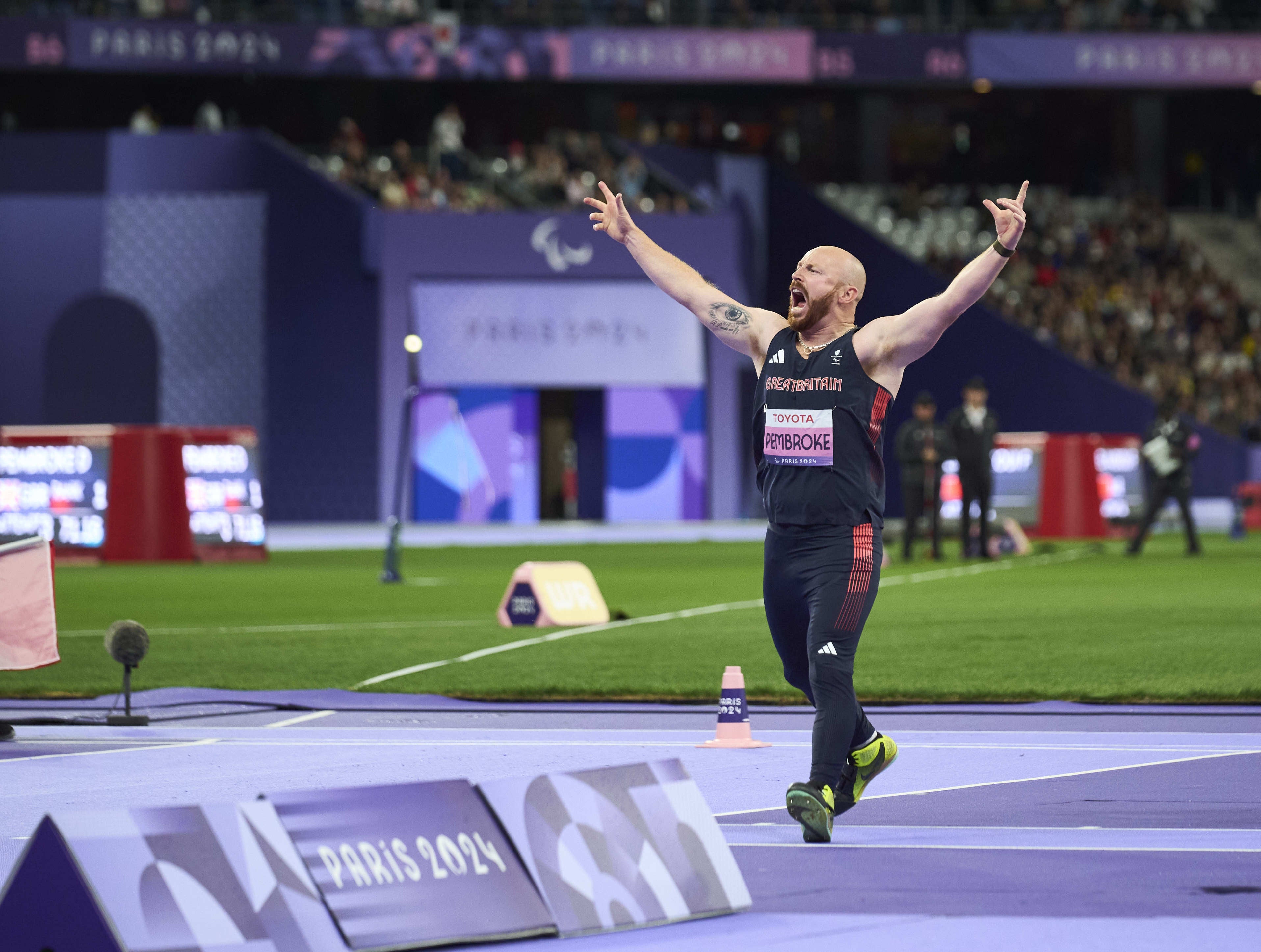 Dan Pembroke celebrates winning gold with a world record throw (Handout photo provided by ParalympicsGB)