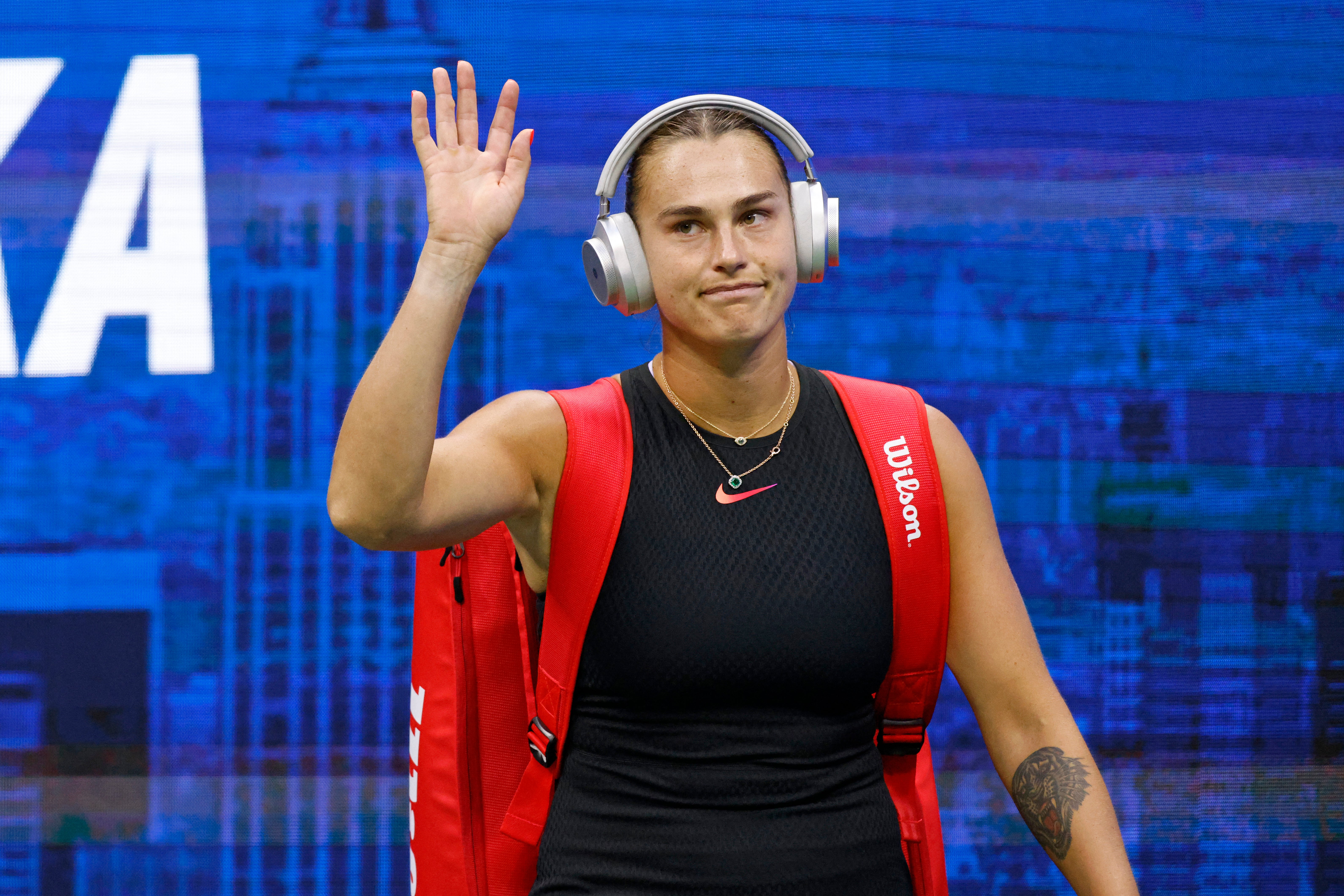 Belarus's Aryna Sabalenka walks into the court ahead of her match against USA's Emma Navarro in their women's semifinals match on day eleven of the US Open tennis tournament at the USTA Billie Jean King National Tennis Center in New York City, on September 5, 2024.