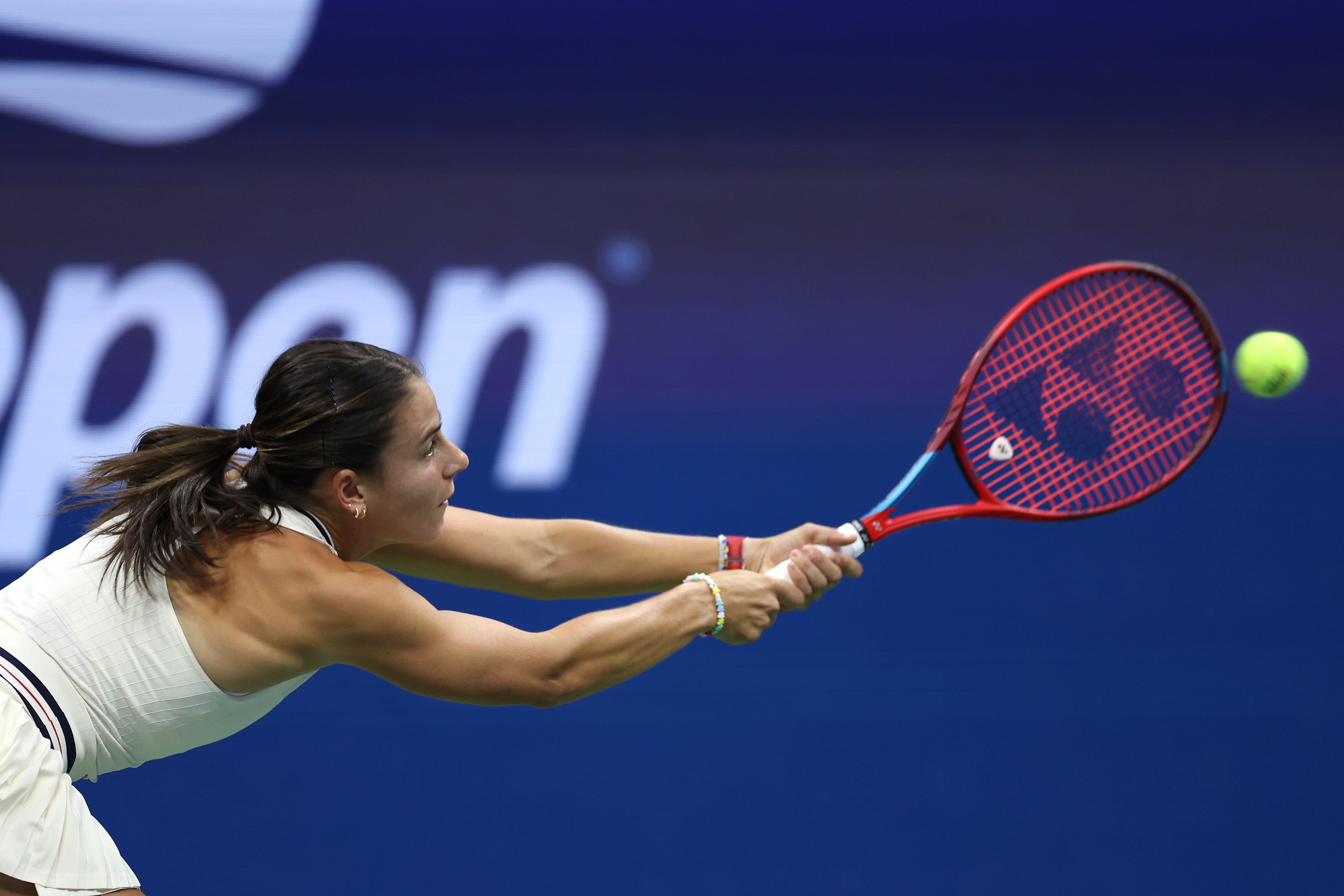 Emma Navarro of the United States returns a shot against Aryna Sabalenka of Belarus during their Women's Singles Semifinal match