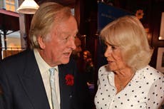 Queen Camilla and former husband Andrew Parker Bowles reunite at son’s book launch