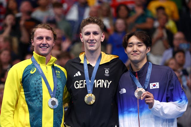 <p>Michael Palfrey backed Kim Woo-min (right), who won 400m bronze behind Elijah Winnington </p>