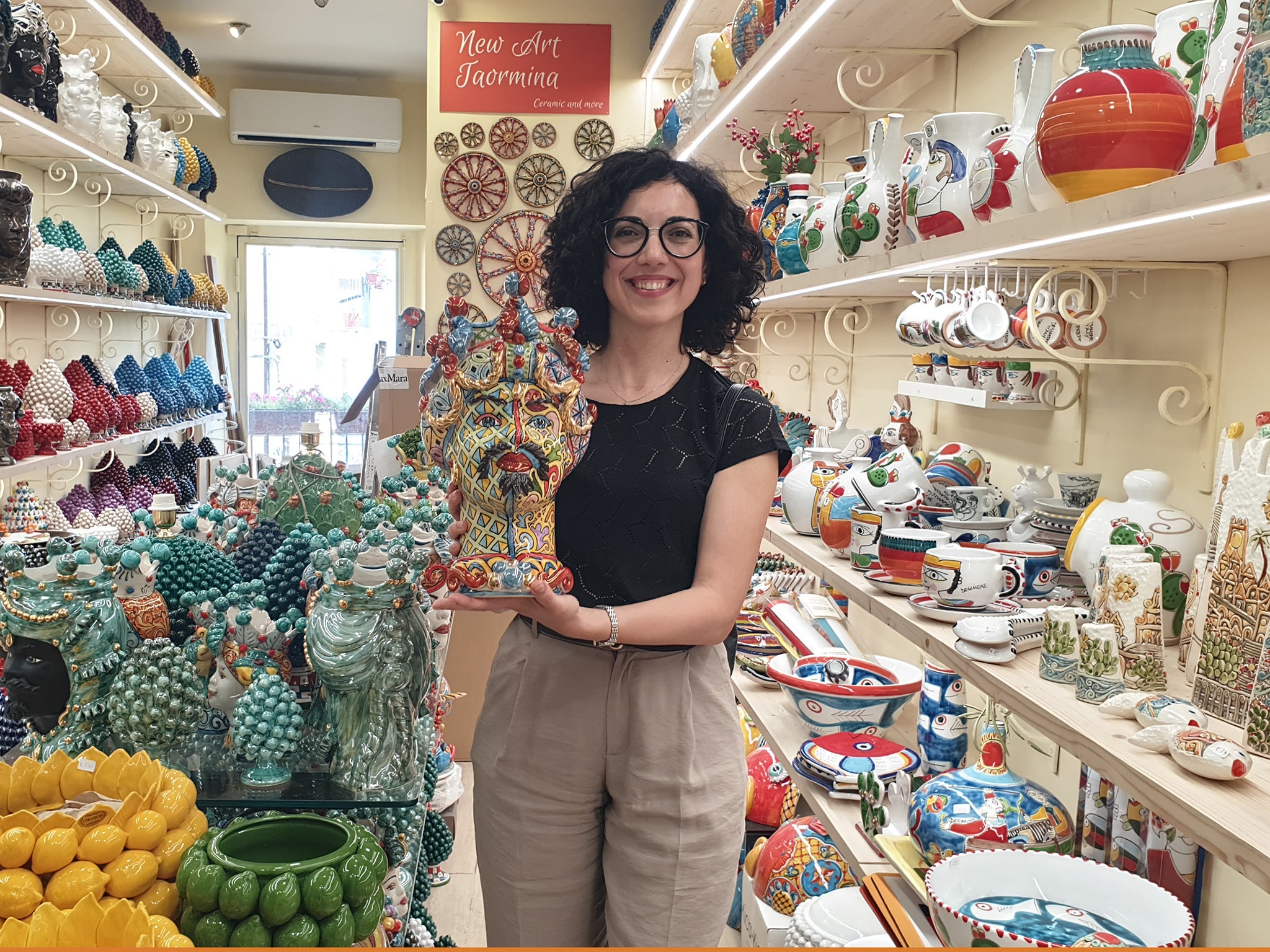 Olga Miano shows off the wares at New Art Taormina