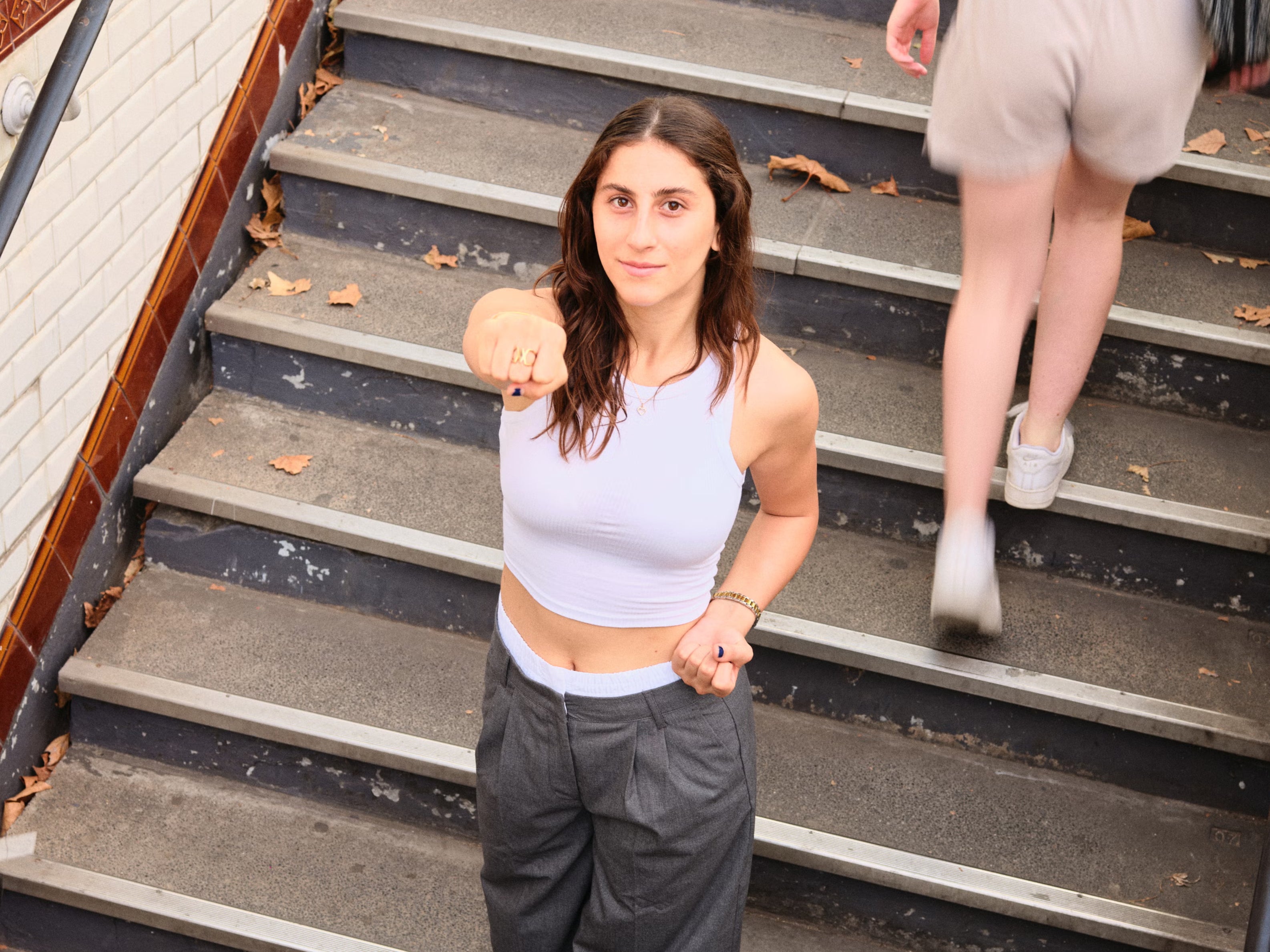 Marzieh Hamidi, Afghan taekwondo champion, seen here on the steps of Pont Marie station in Paris, France