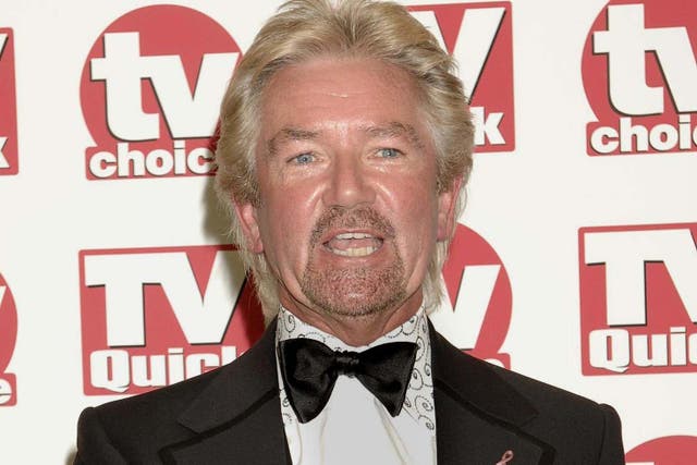 Veteran presenter Edmonds is set to return to TV screens (Yui Mok/PA)