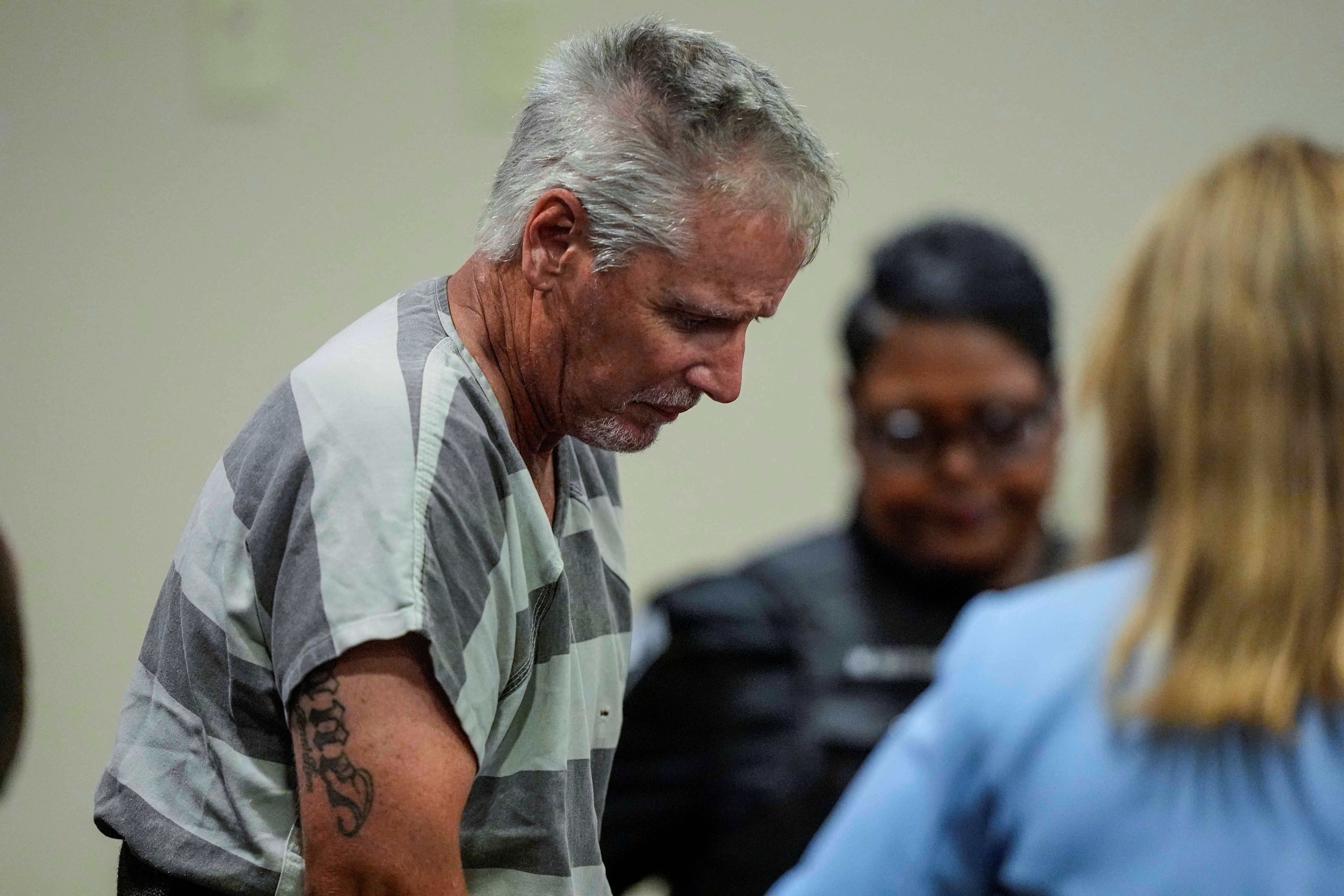 Colin Gray appeared in court on Friday to face murder charges over a school shooting his 14-year-old son is accused of committing earlier this week