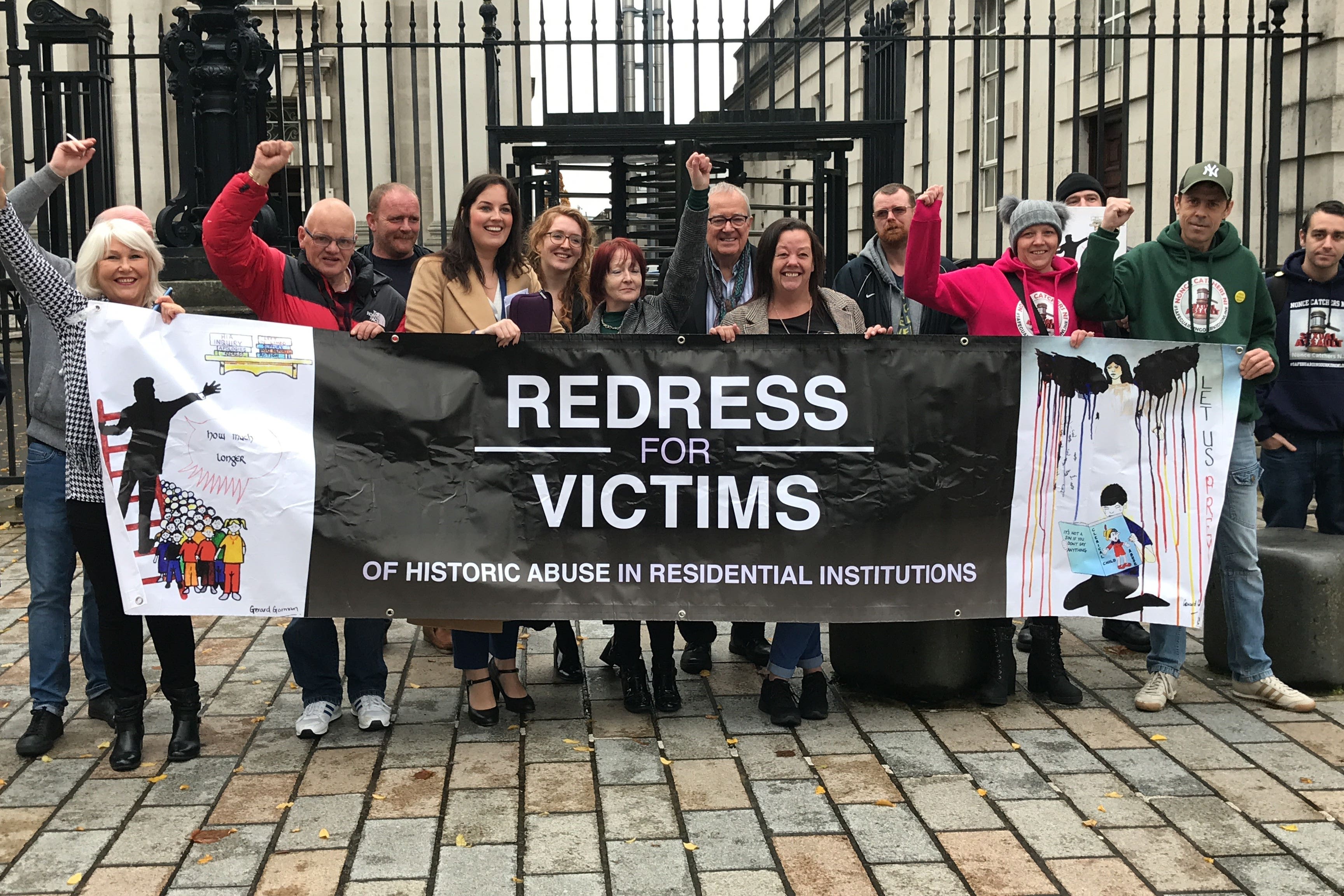 Survivors of historical institutional abuse outside the Court of Appeal in Northern Ireland in 2019, after it ruled that the Executive Office has the power to introduce a compensation scheme for victims of historical institutional abuse (Rebecca Black/PA)