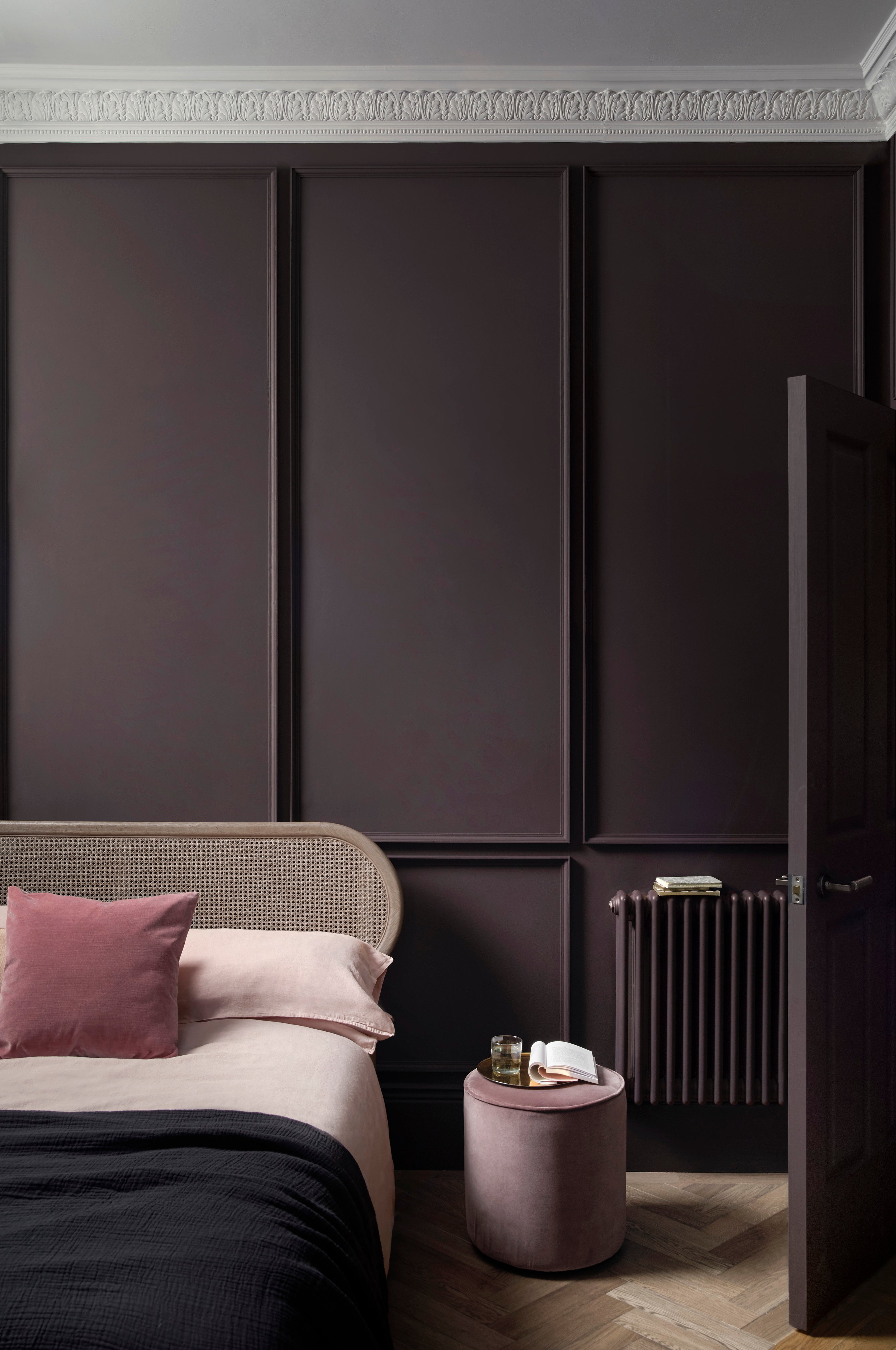 Give your bedroom an intimate feel by embracing the dark side