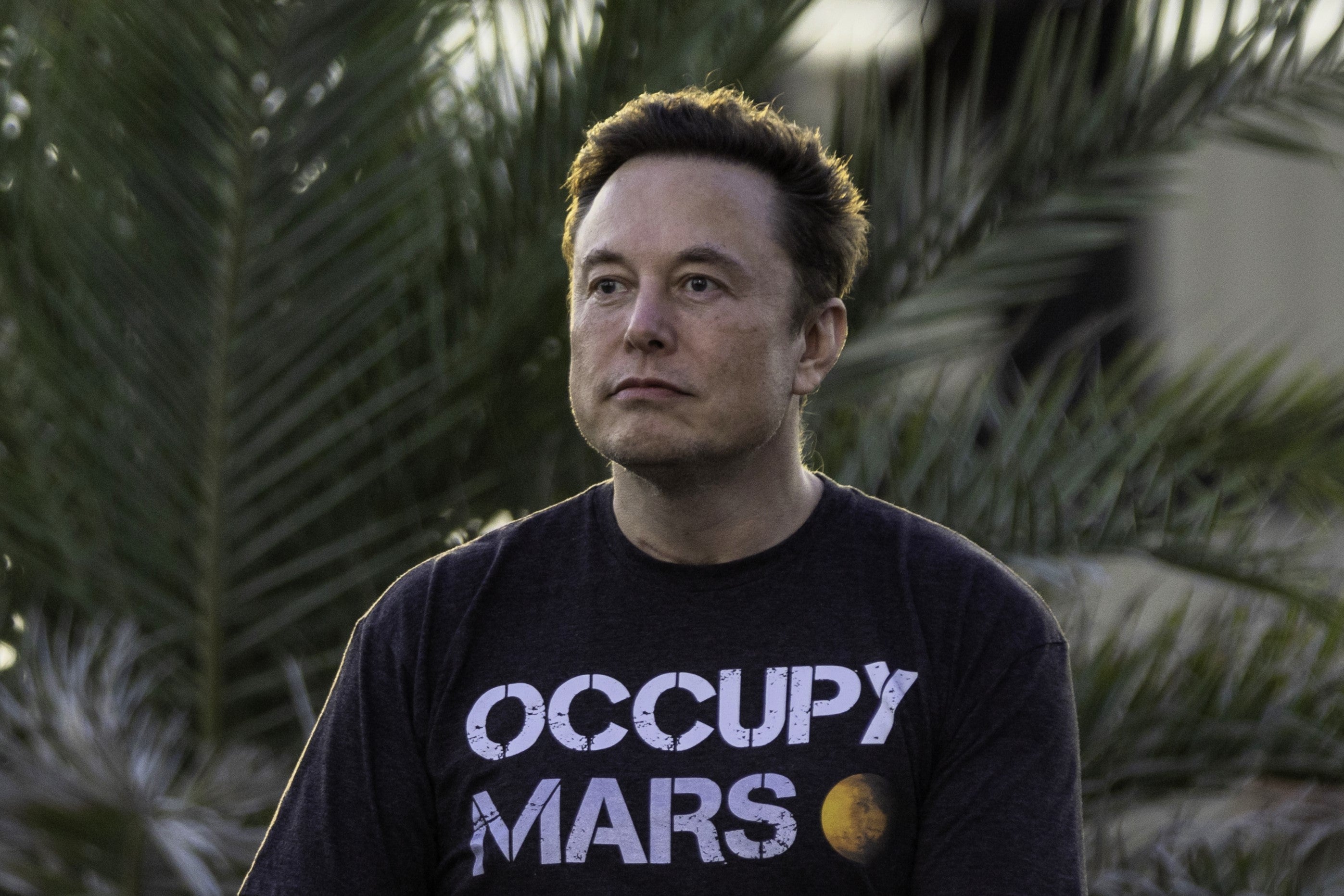 SpaceX founder Elon Musk wearing an ‘Occupy Mars’ T-shirt during an event on 25 August 2022, in Boca Chica Beach, Texas