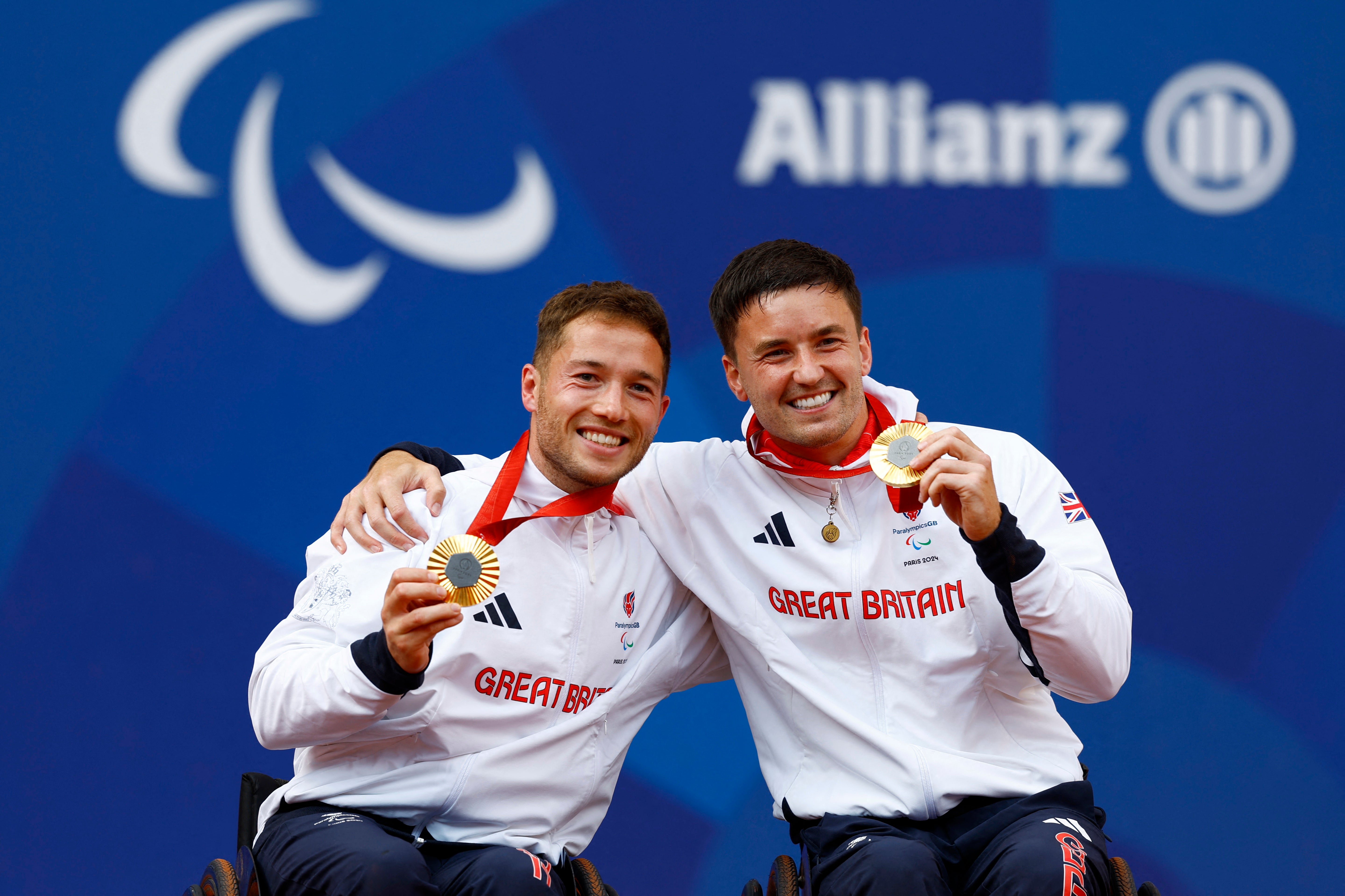 Great Britain’s Alfie Hewett and Gordon Reid pose with their gold medals.