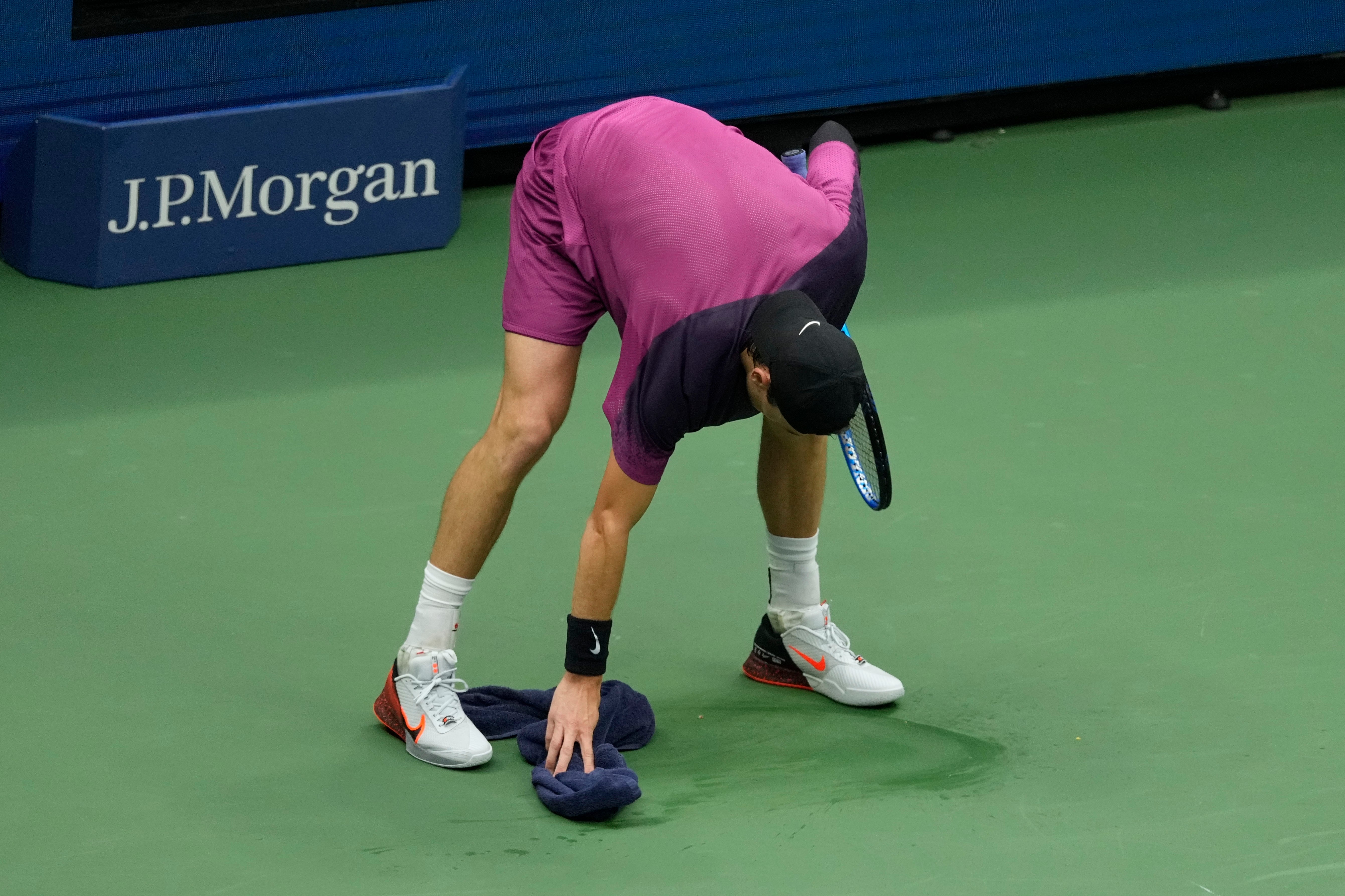 Draper had to clean up his own vomit as he physically struggled (Seth Wenig/AP)