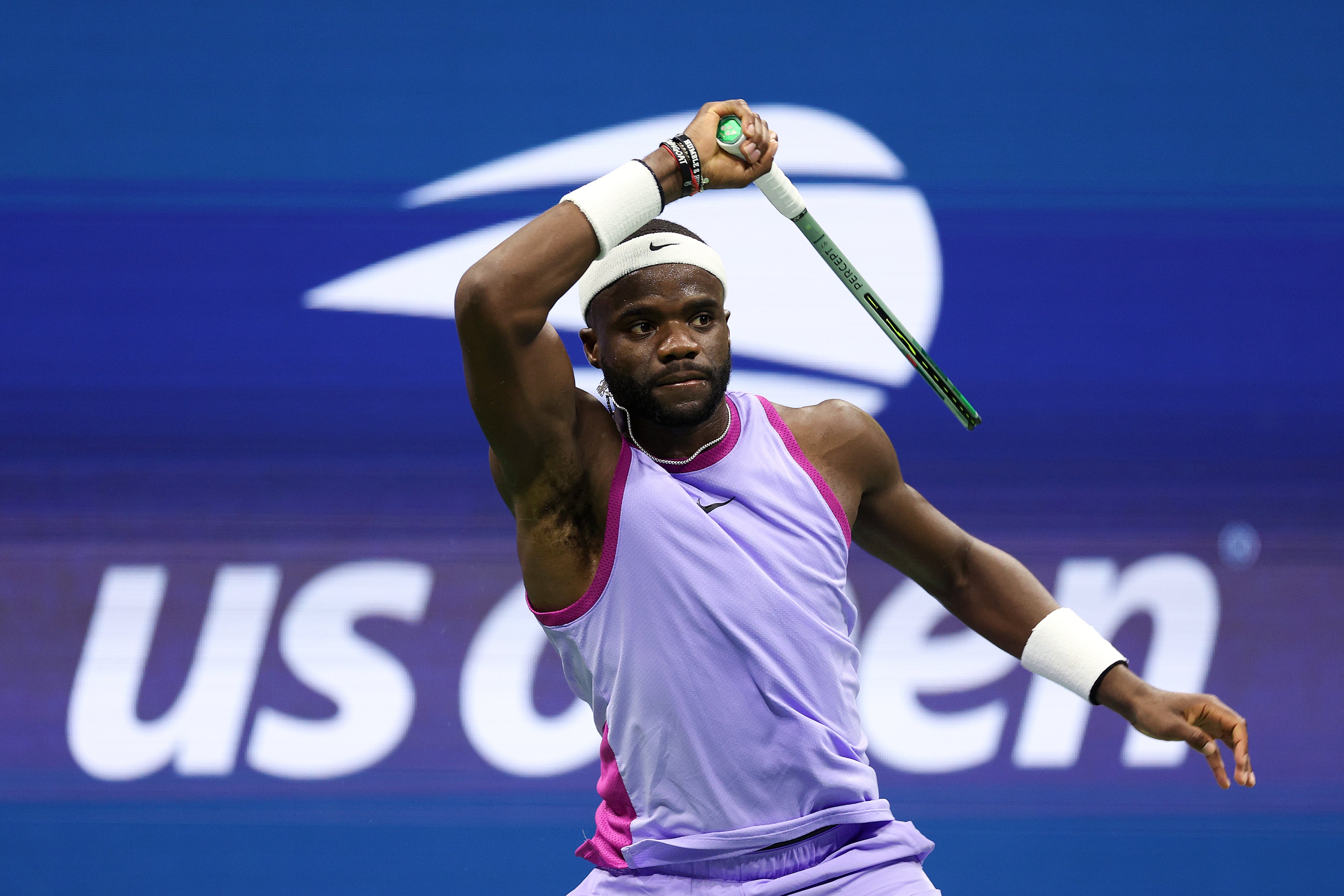 Frances Tiafoe of the United States returns a shot against Taylor Fritz of the United States during their Men's Singles Semifinal match on Day Twelve of the 2024 US Open at USTA Billie Jean King National Tennis Center on September 06, 2024 in the Flushing neighborhood of the Queens borough of New York City. (Photo by Jamie Squire/Getty Images)