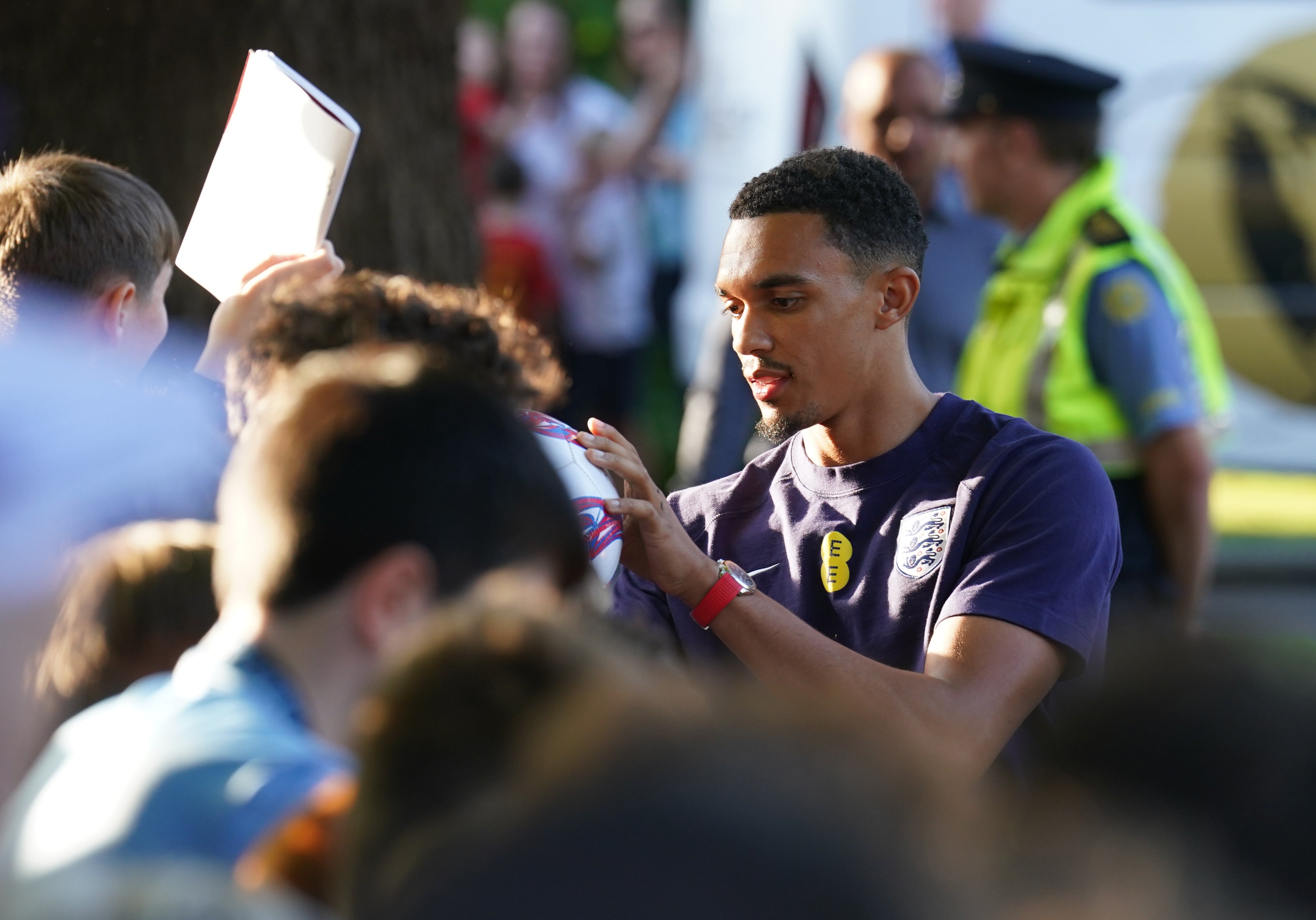 Trent Alexander-Arnold signs autographs for fans as the players arrive at Carlton House, County Kildare.