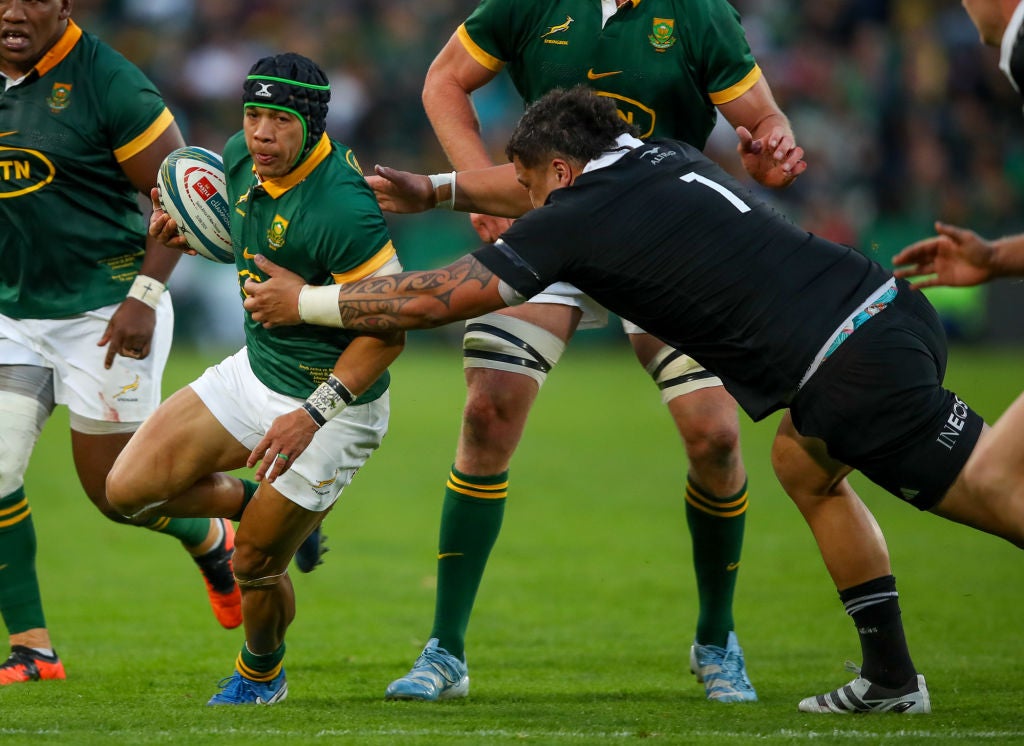 Tamaiti Williams of the All Blacks tries to tackle Cheslin Kolbe of the Springboks during last week’s match