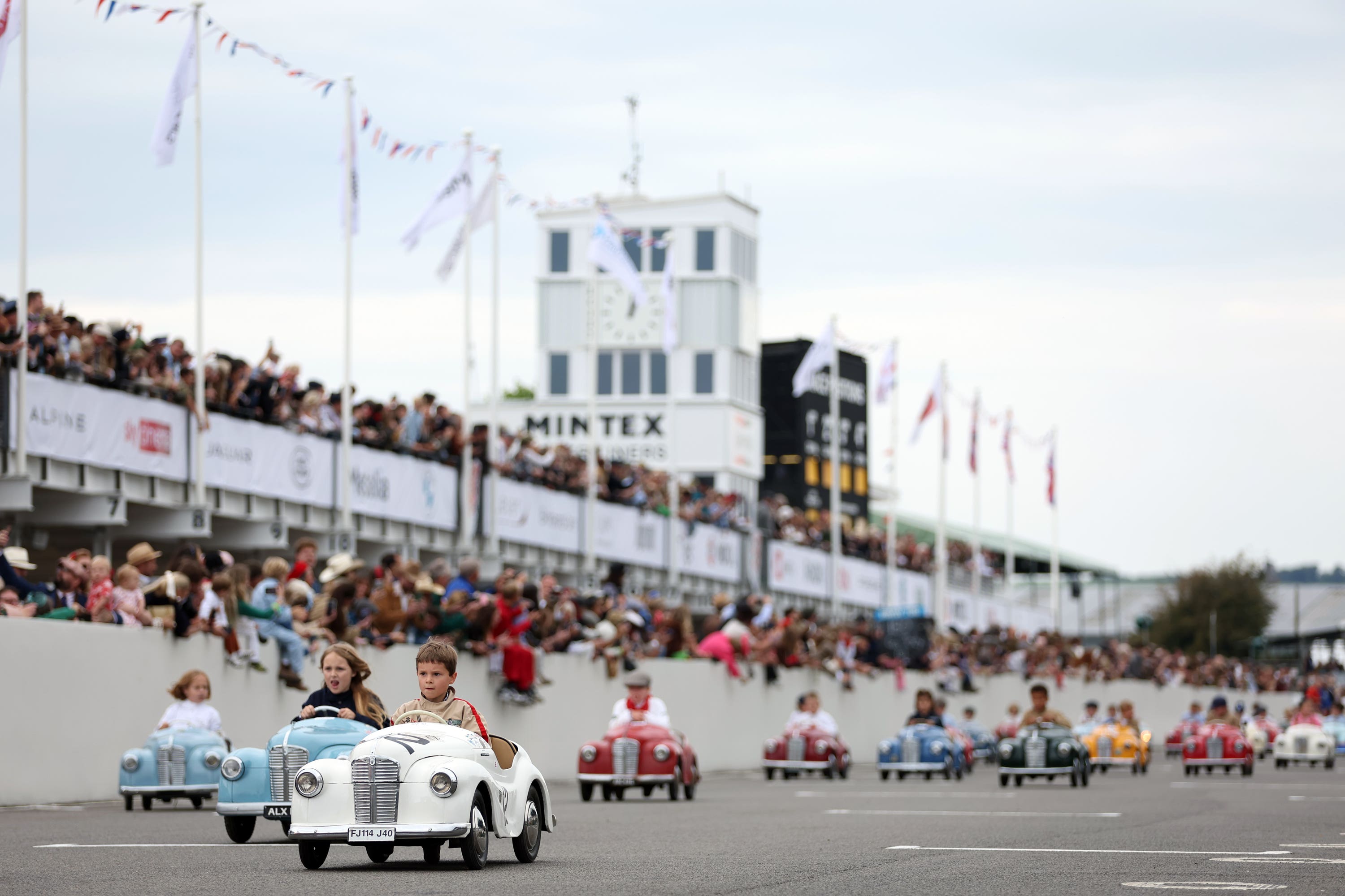 Young racers compete in the Settrington Cup at the Goodwood Revival in West Sussex (Kieran Cleeves/PA)