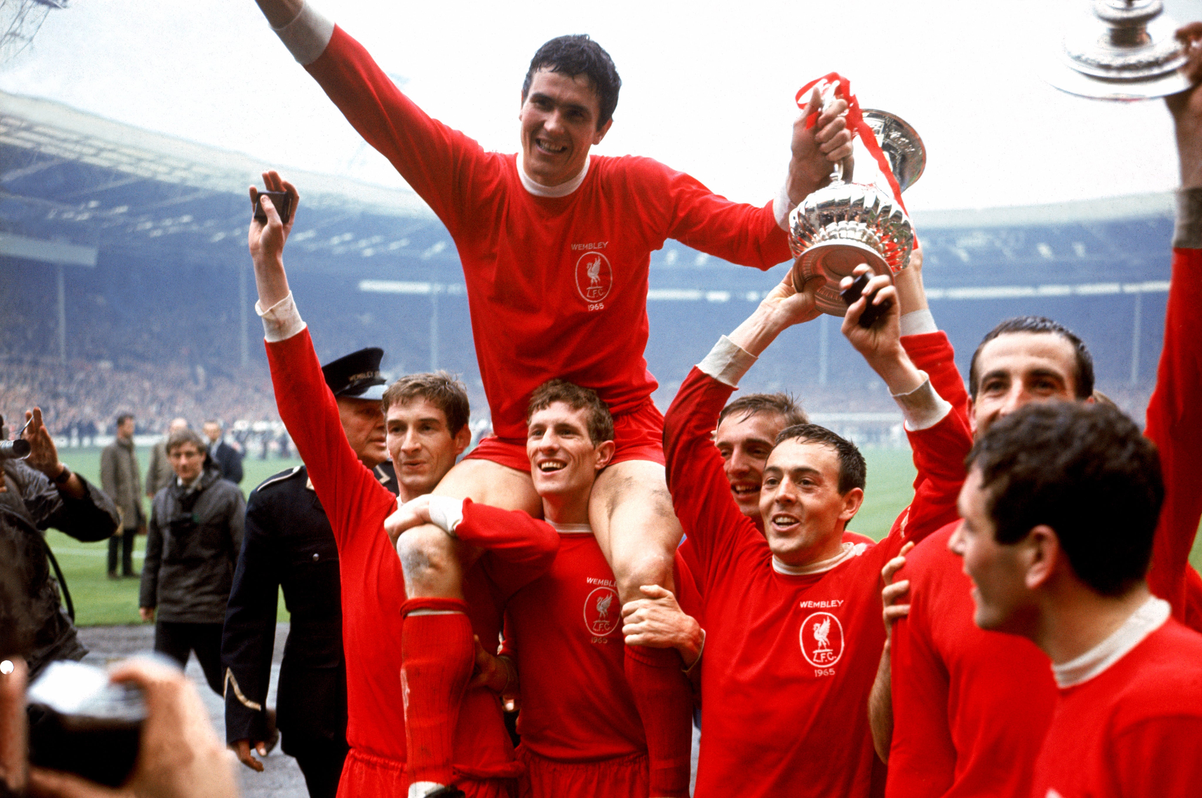 Champion: Yeats holds the FA Cup aloft after a thrilling win against Leeds in 1965