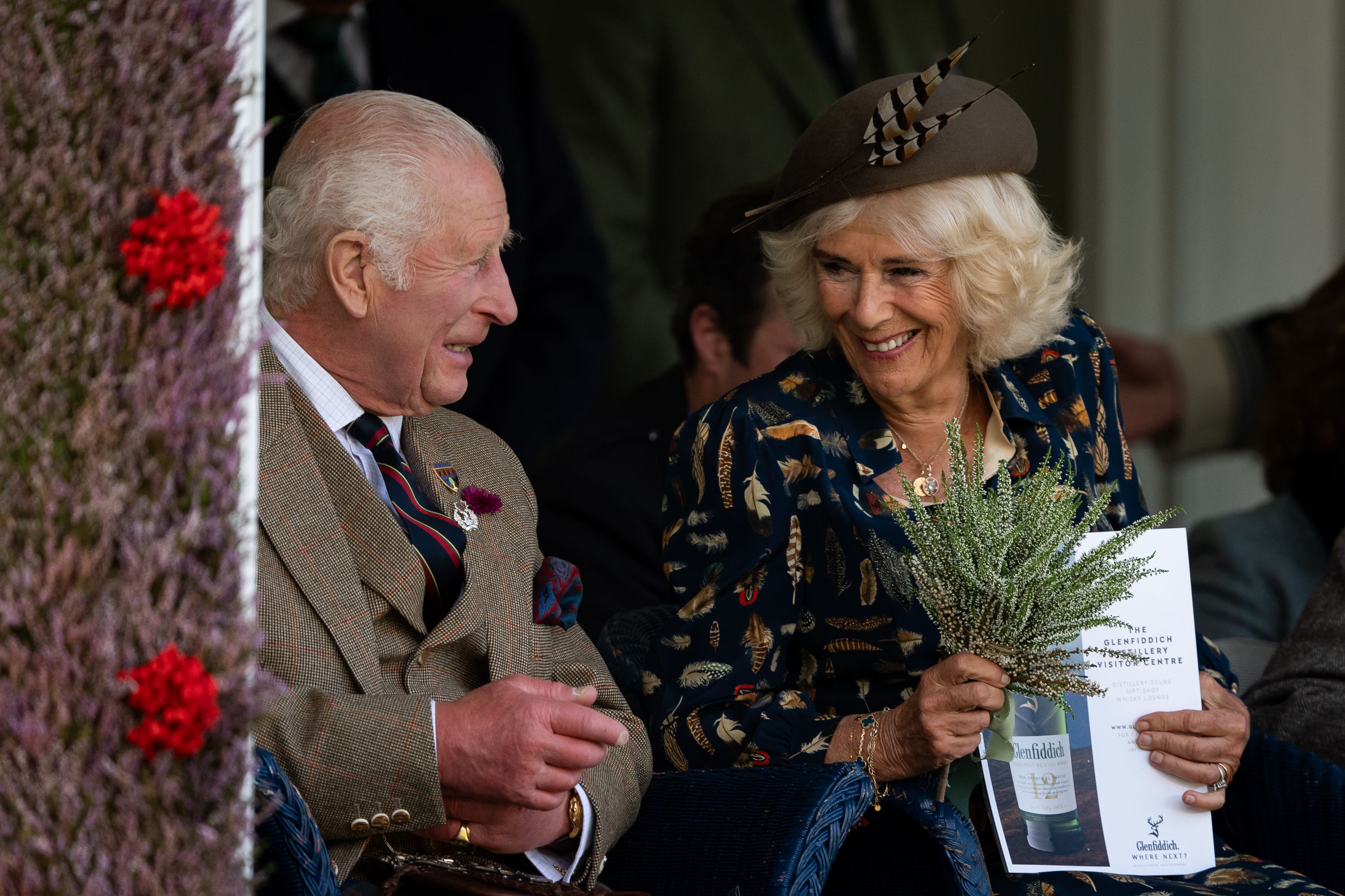 The royal couple shared a smile as they chatted at the annual event (Aaron Chown/PA)