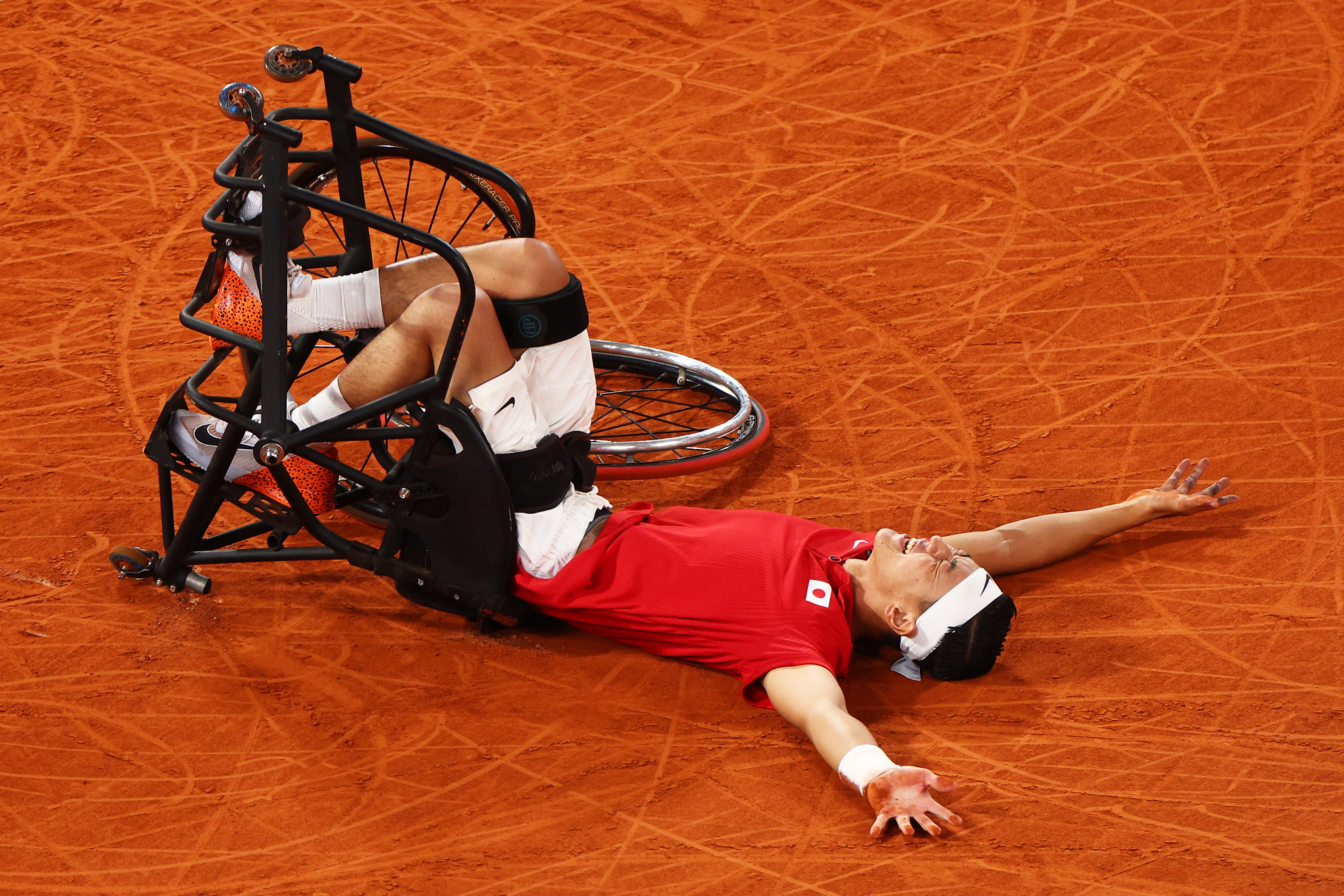 Japan’s Tokito Oda celebrates after clinching tense Paralympic final against Hewett.