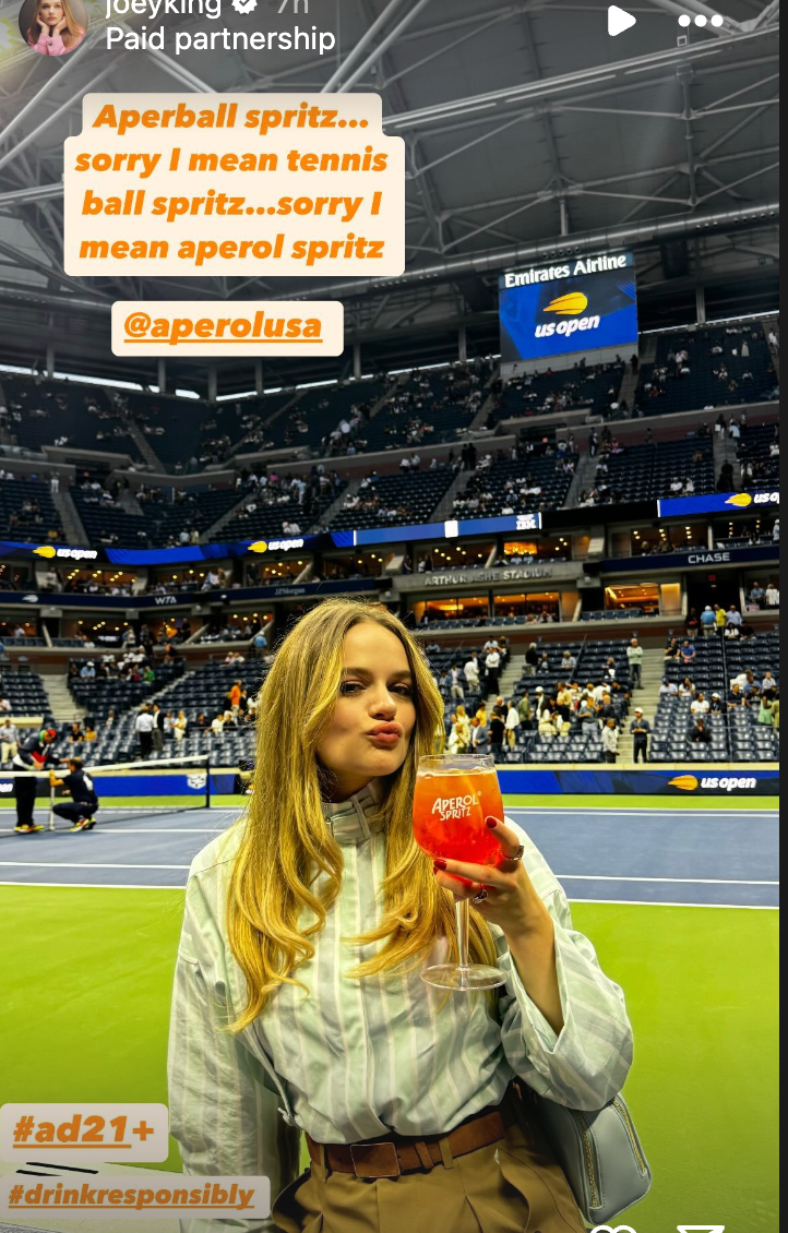 Joey King poses with Aperol as she attends US Open on September 6