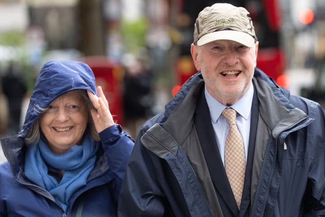 <p>Alan Bates, accompanied by Suzanne Sercombe, arriving at Aldwych House, central London, to give evidence to the Post Office Horizon IT Inquiry (Stefan Rousseau/PA)</p>