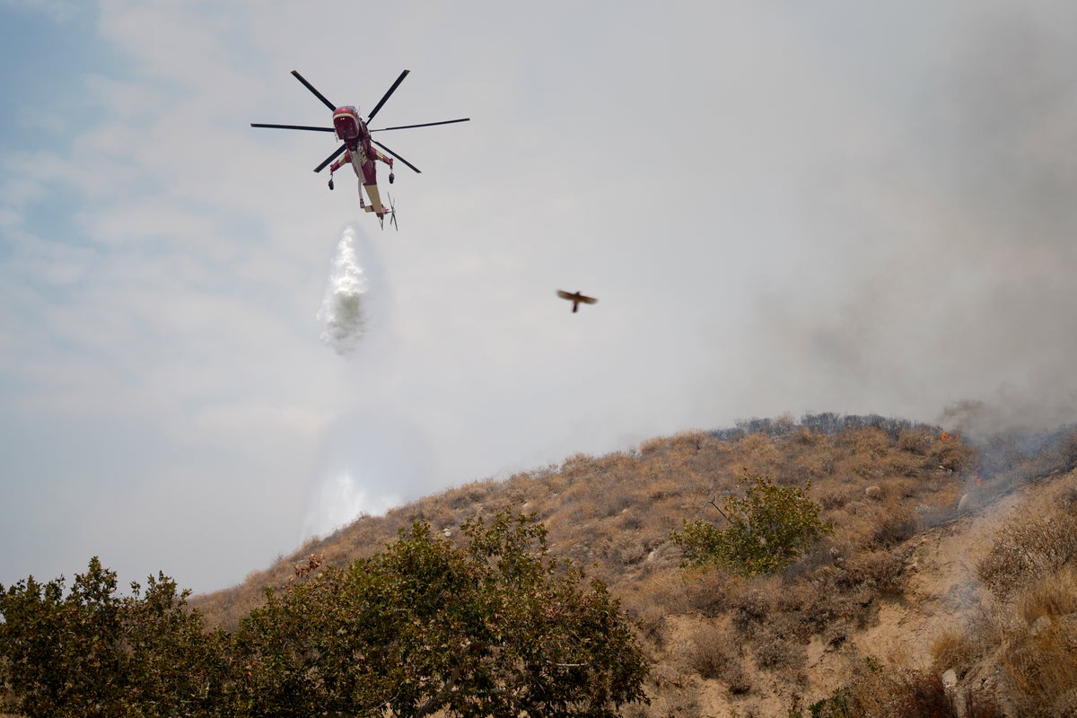 Evacuations ordered as wildfire burns in foothills of national forest east of LA