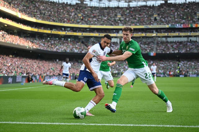 <p>Trent Alexander-Arnold is pressurised by Ireland’s Nathan Collins</p>